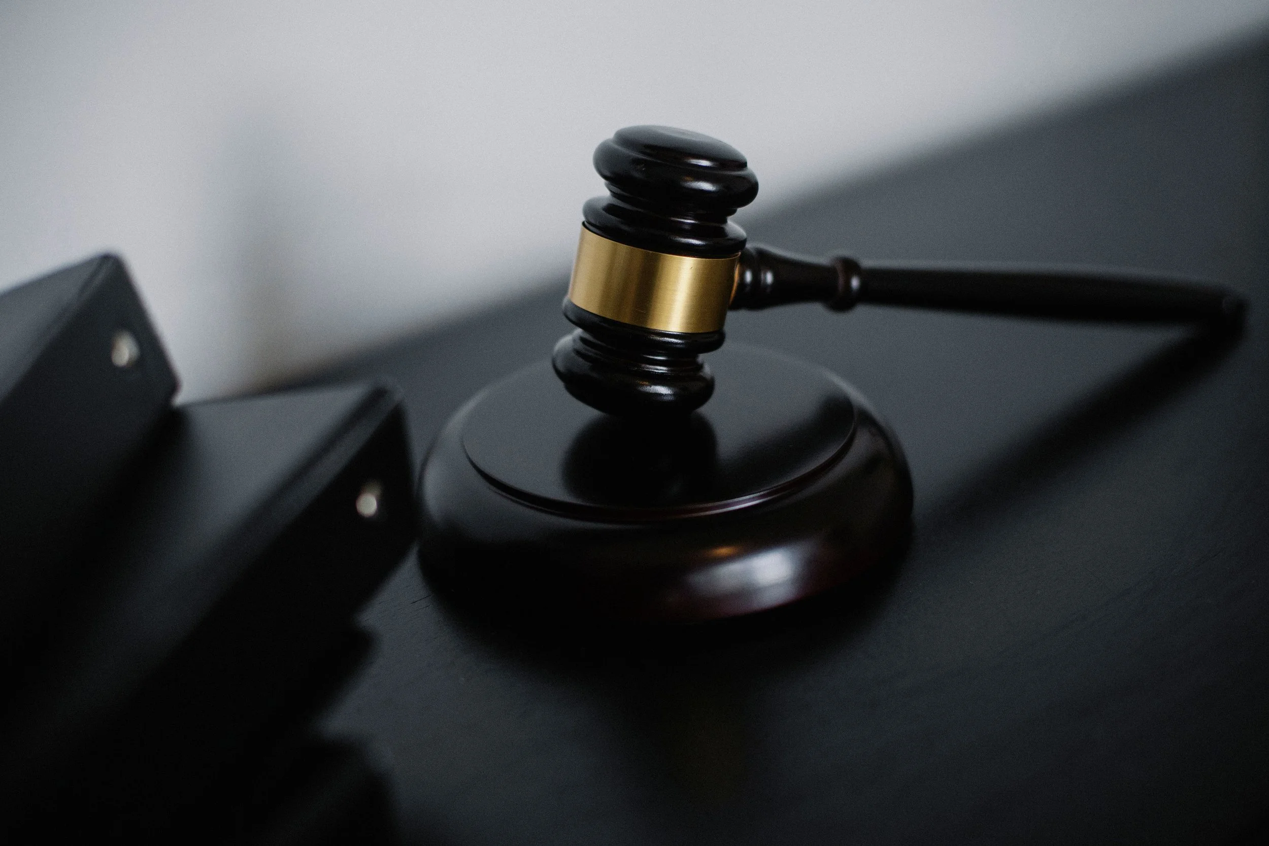 Gavel and case binders, representing a Rockaway personal injury law firm helping local clients
