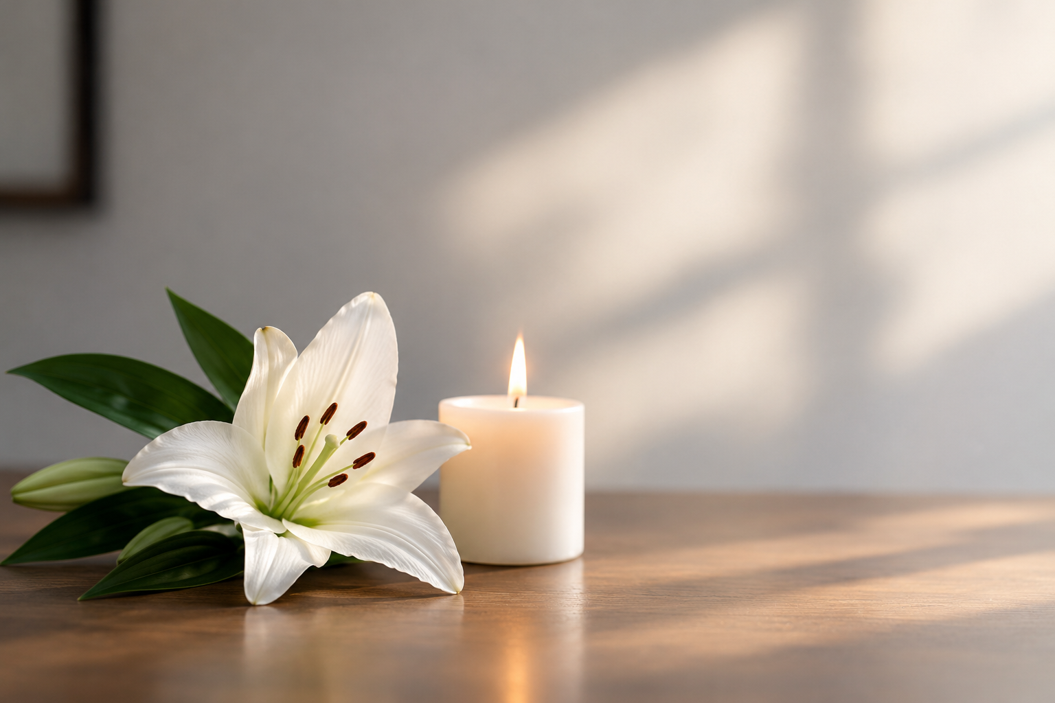 White lily and candle symbolizing remembrance for a wrongful death claim in New Jersey, where a personal representative files a lawsuit on behalf of the family.