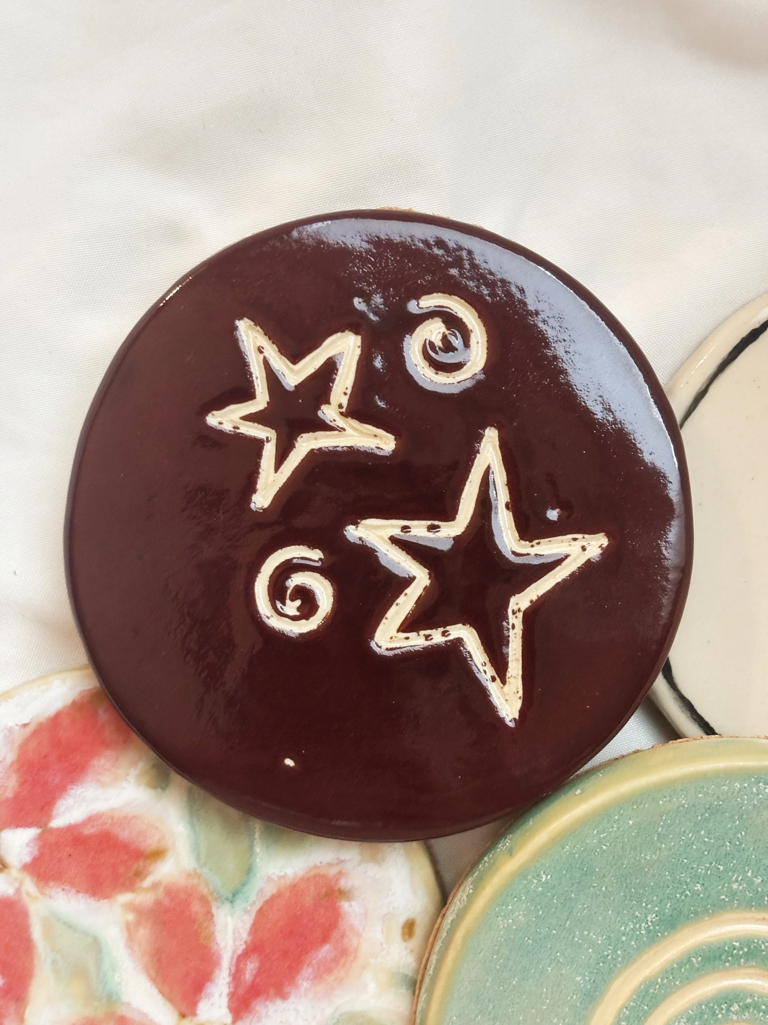 Cherry Wine Stars and Spirals Coaster.JPG