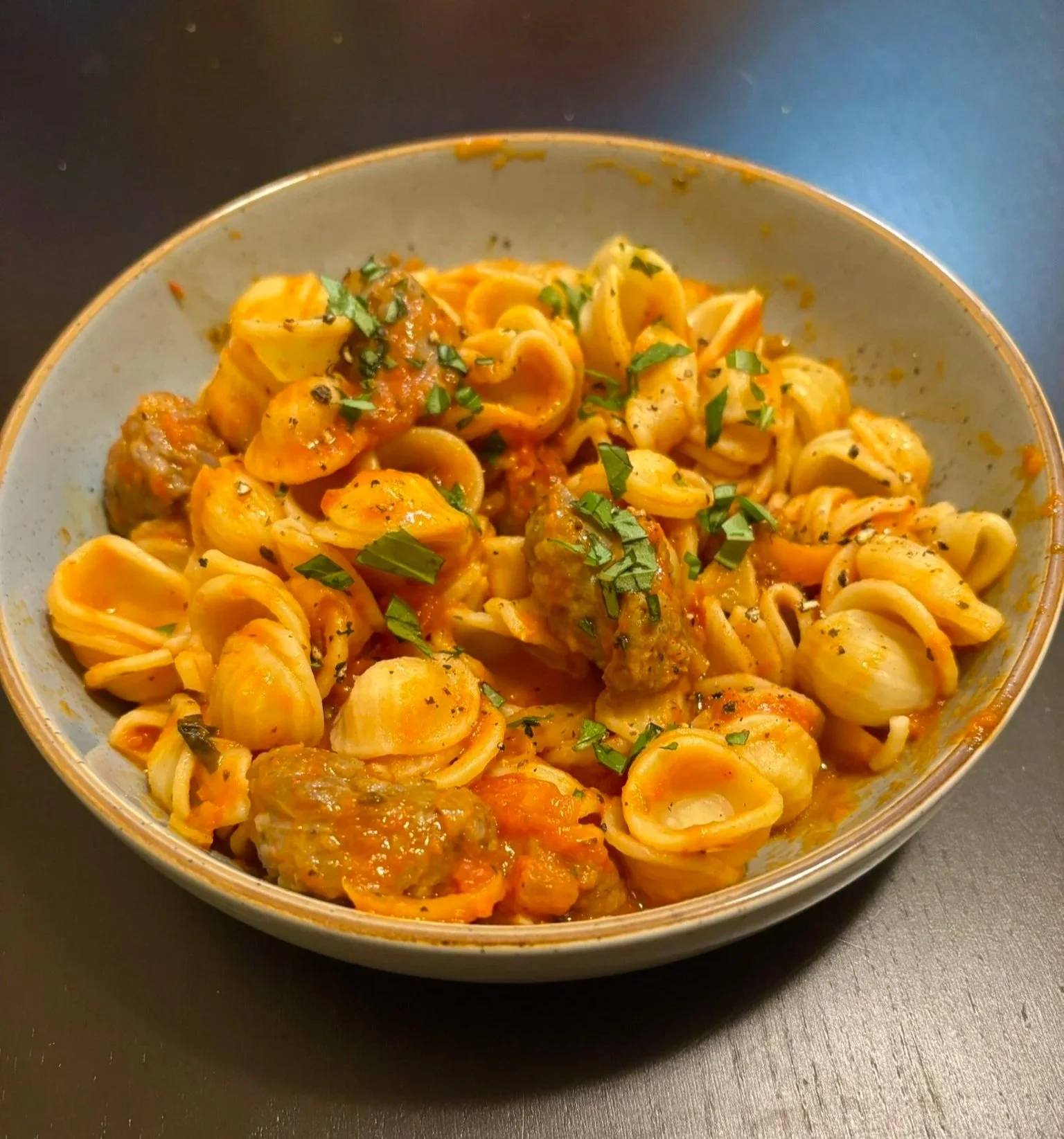 Pasta with Arrabbiata Vodka Sauce, Peppers, Onions, and Italian Sausage!