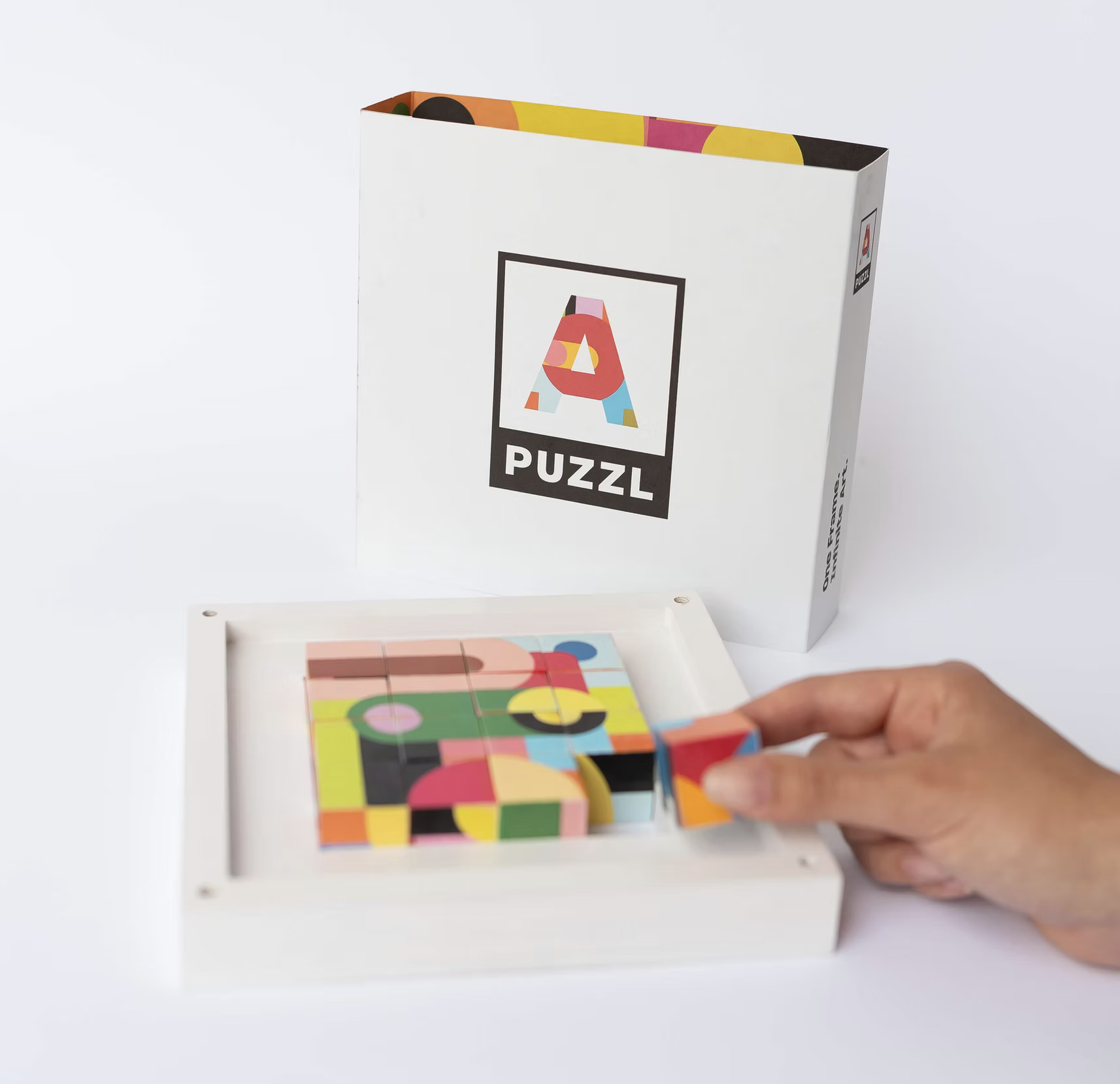 APUZZL-by Molly Spain-product-withhand.png