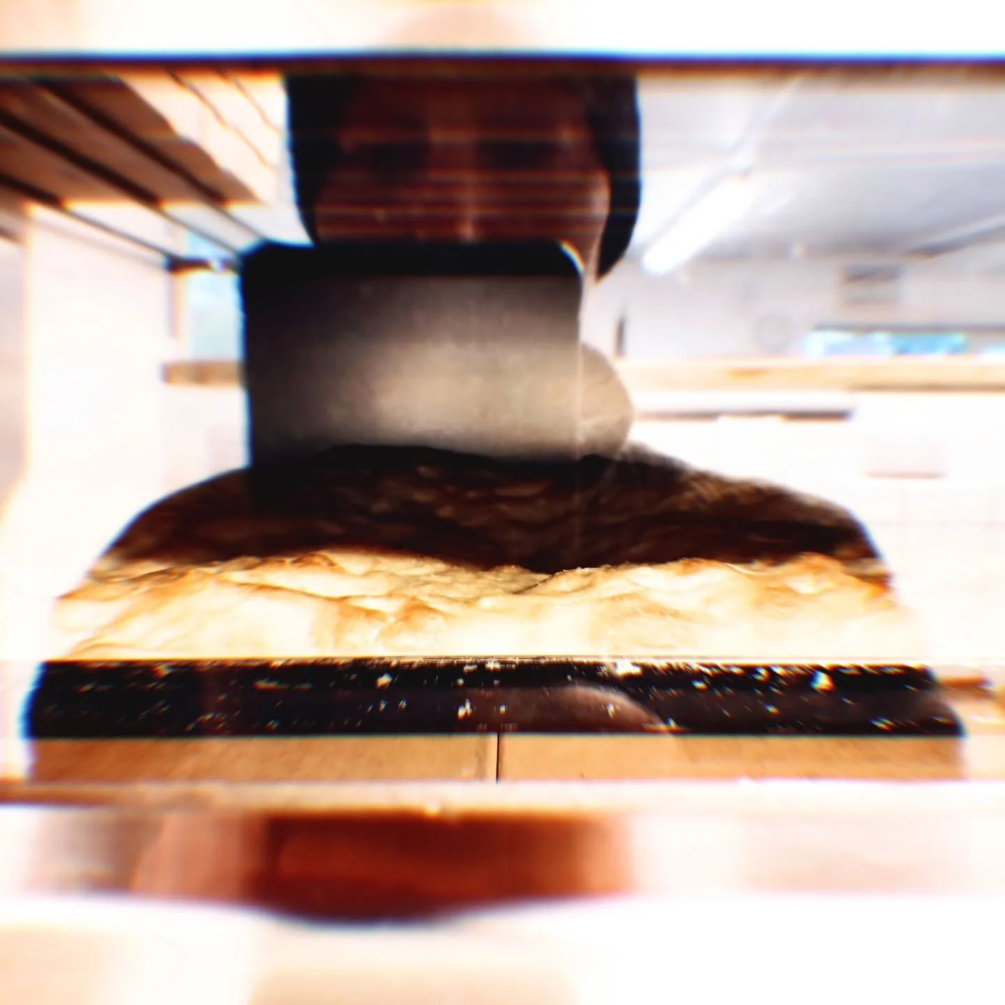 Early morning. Looking through the lens of the oven door. 

#focaccia 
#dough 
#softsharp 
#scottishautumn