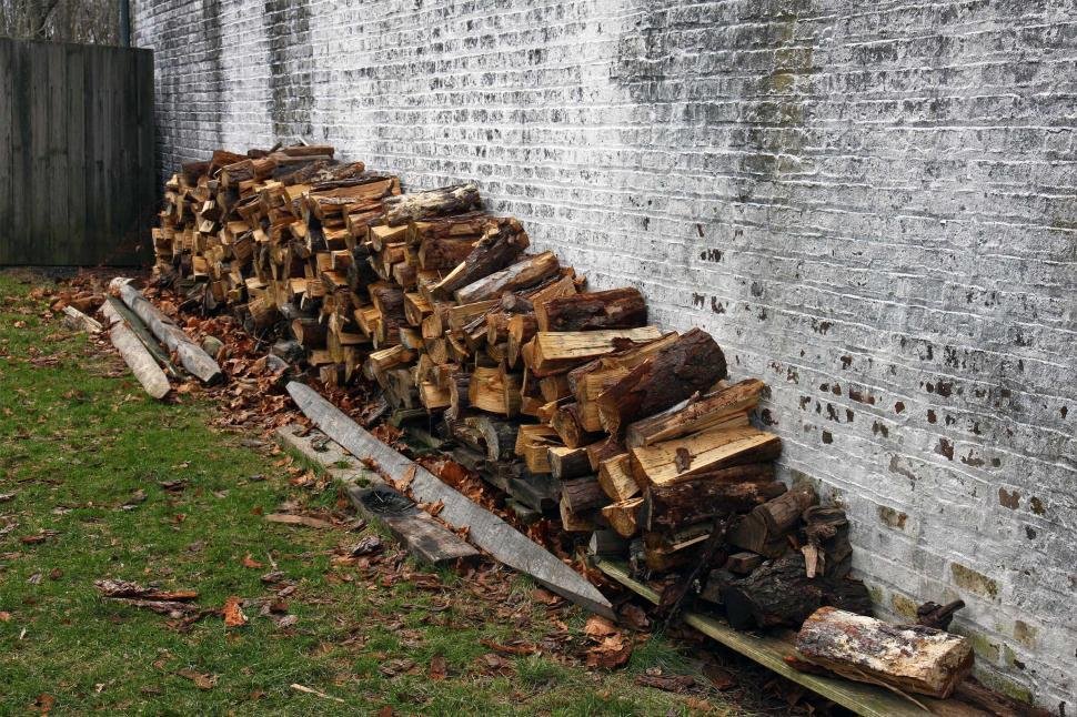 firewood stacked against house attracts spiders oklahoma