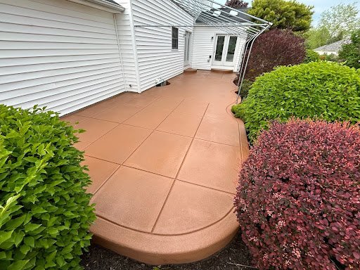Residential exterior and landscaped patio at a Western New York home