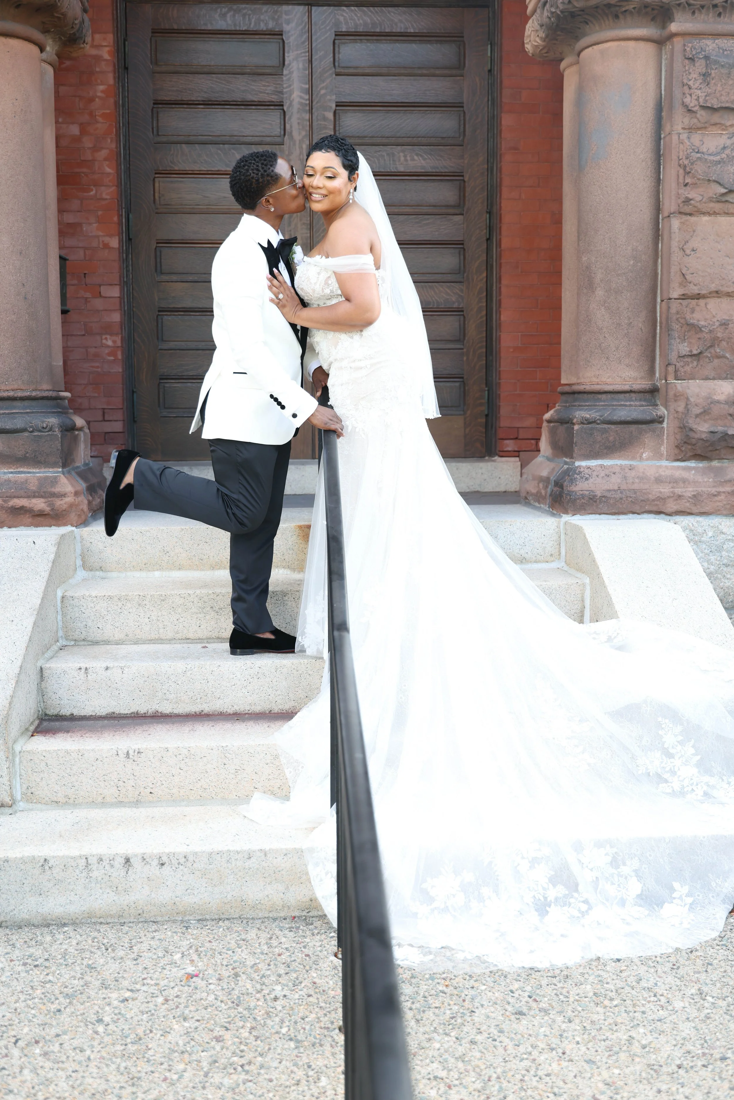 DeeAnna & Tyana’s Luxury Wedding | The Grand Chateau Owl | Couple on Staircase