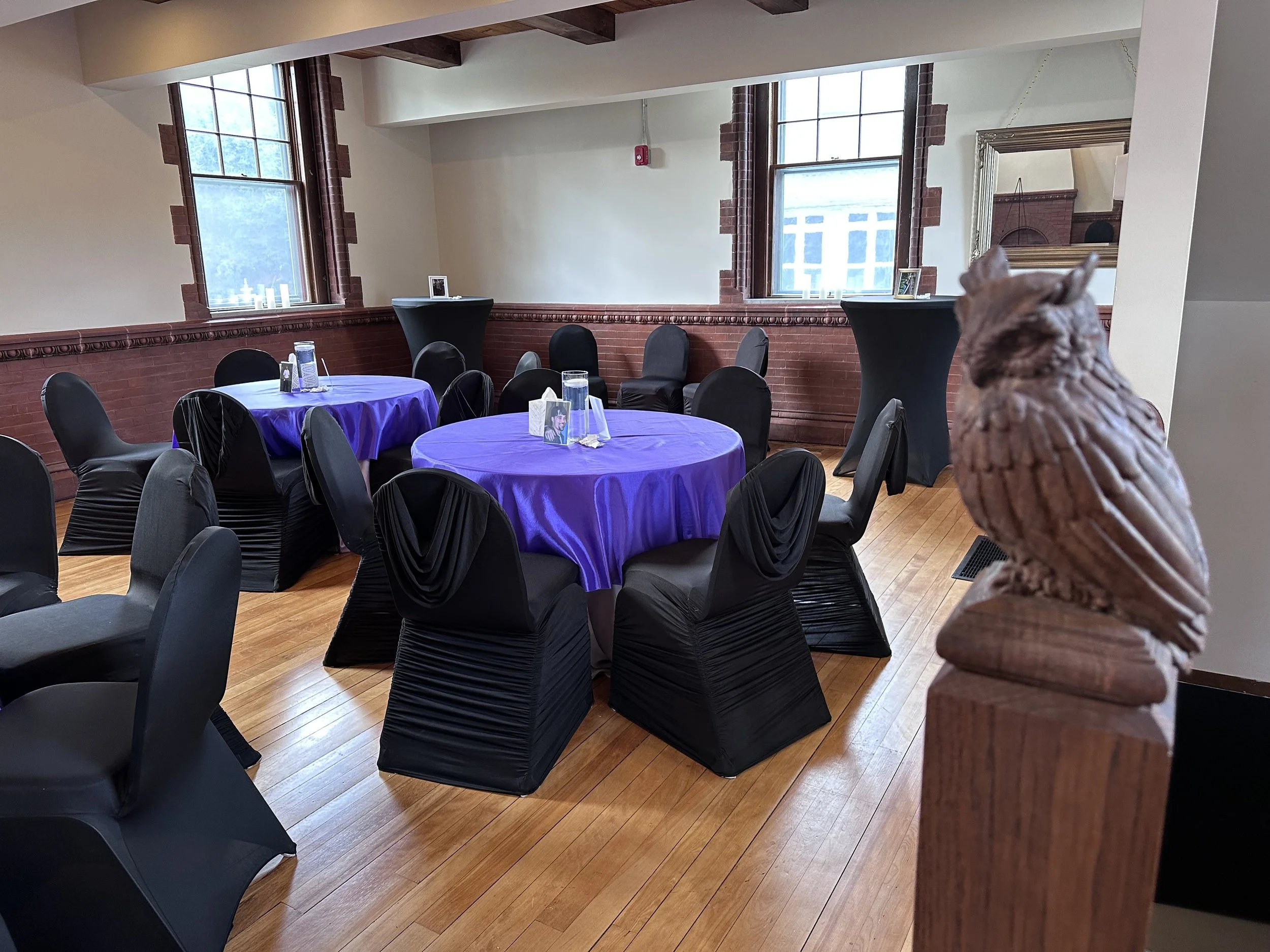 Celebration of life gathering at Grand Chateau Owl Wedding and Event Venue in Norton, Massachusetts, with a thoughtfully arranged setting for remembrance.