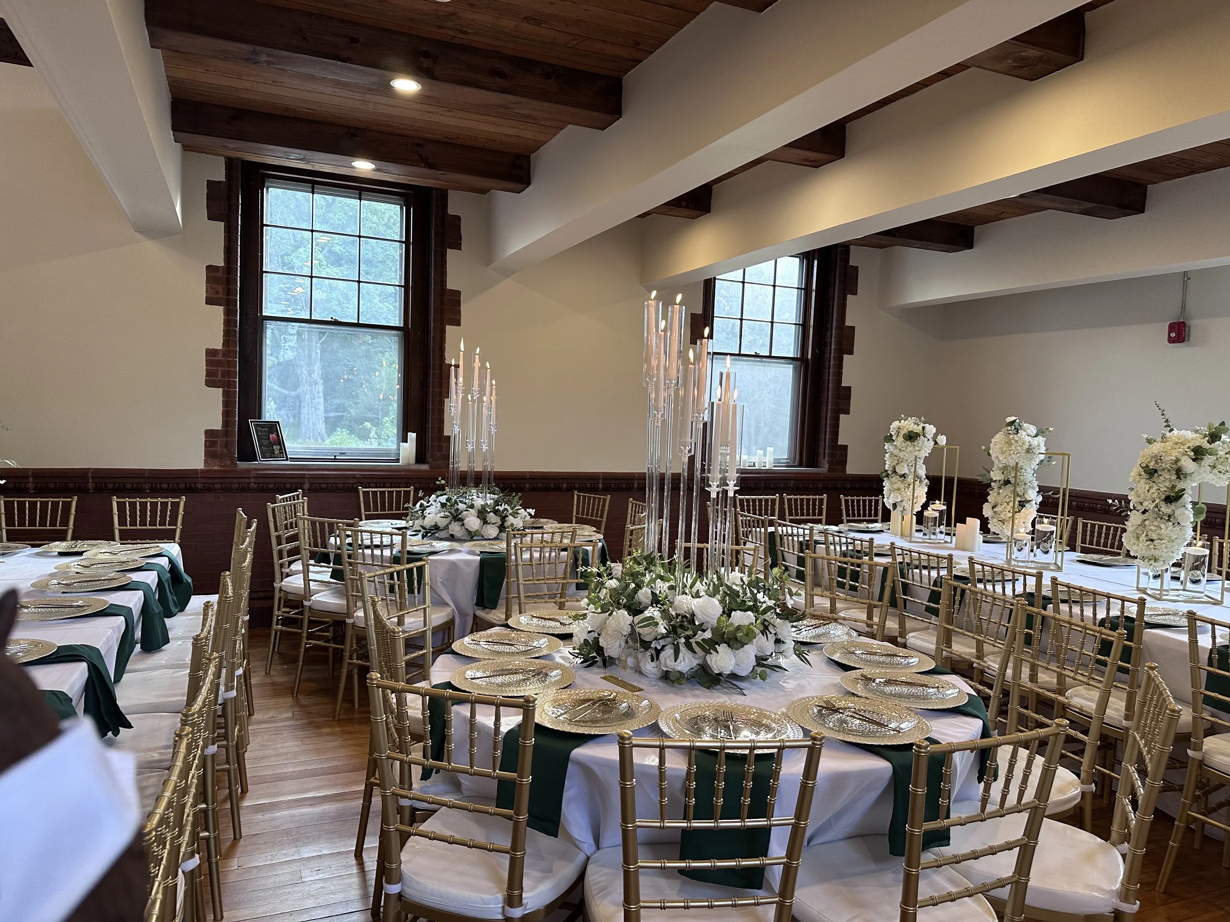 Luxury wedding celebration at Grand Chateau Owl Wedding and Event Venue in Norton, Massachusetts, showcasing elegant wedding design and refined event styling.