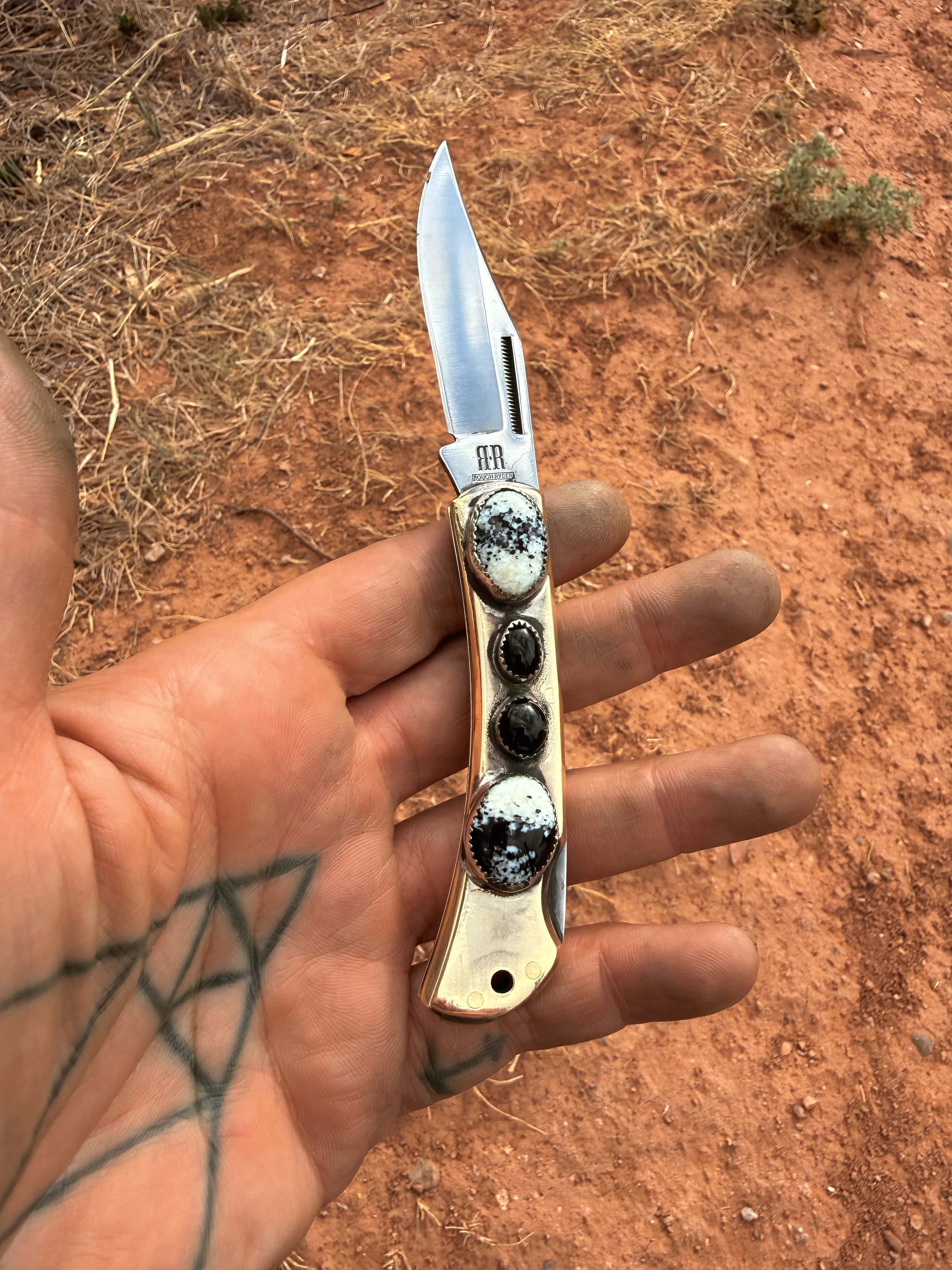 White Buffalo and Onyx Pocketknife