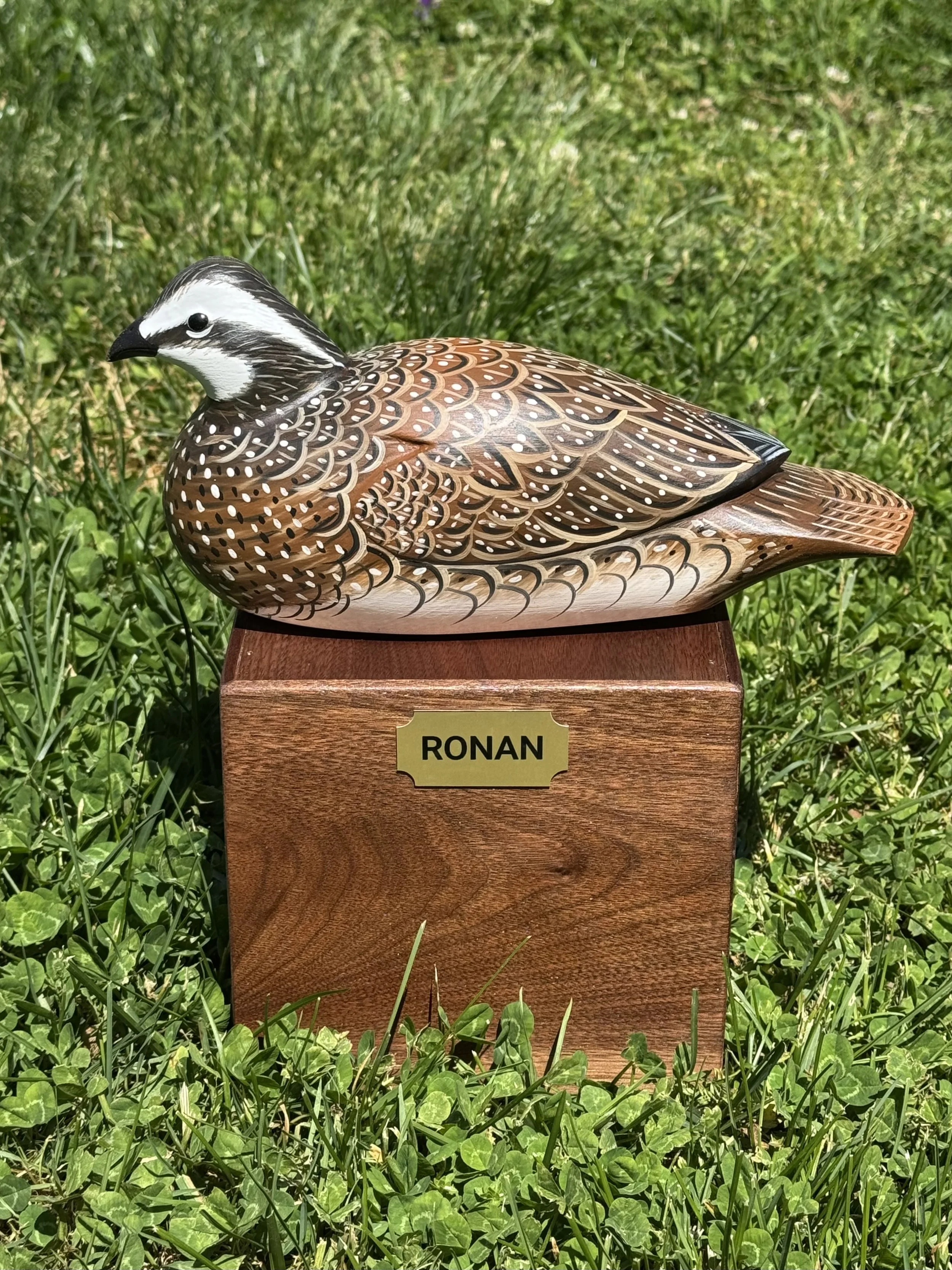 Oversized Resting Quail urn.