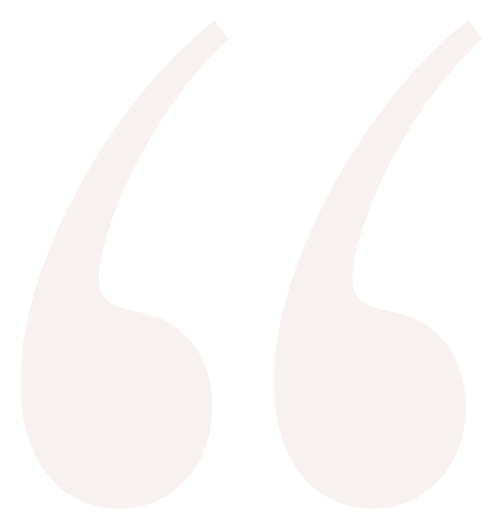 Large white quotation marks on a black background.