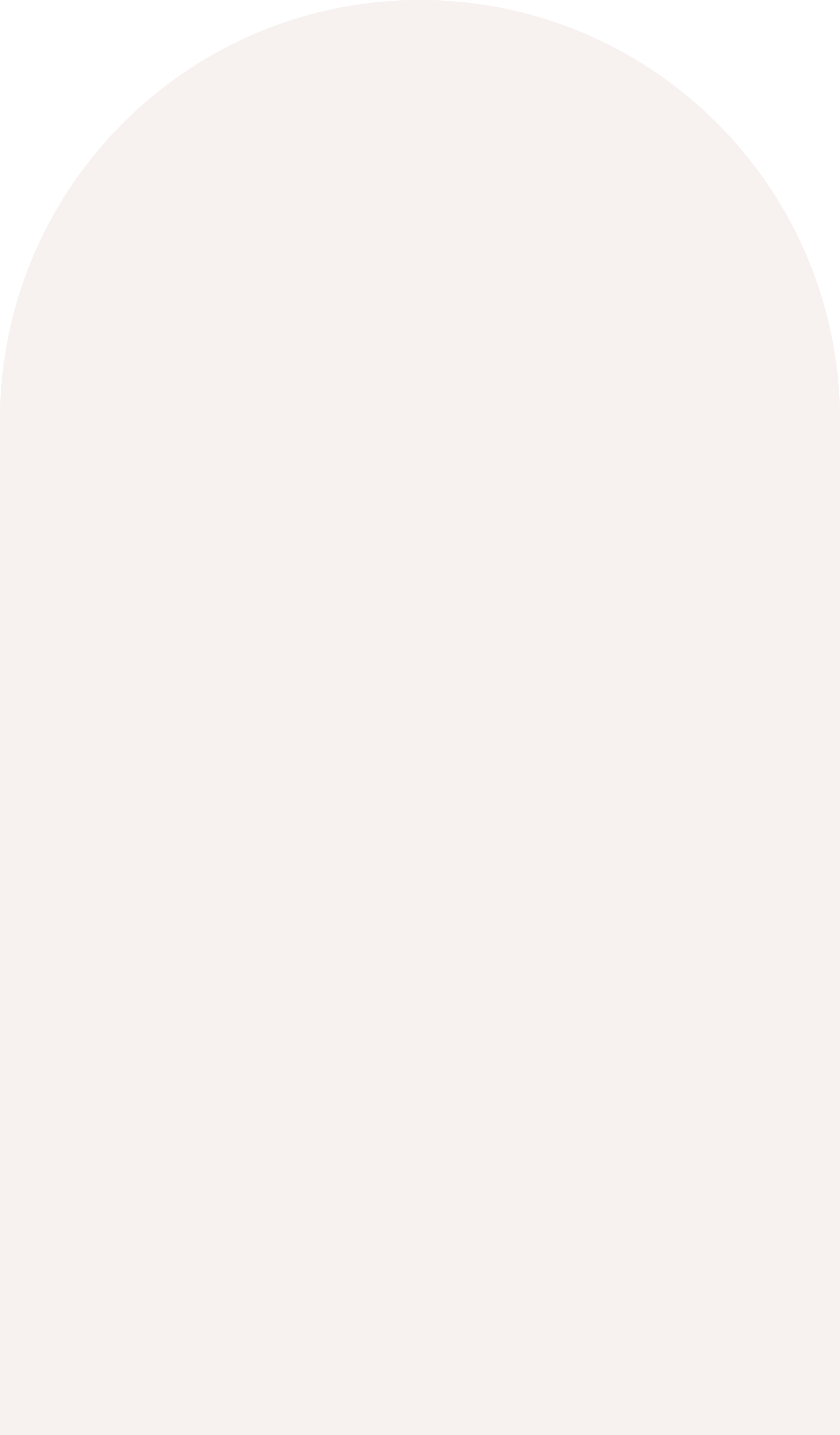 A person wearing a black sweater and a face mask holding a pen and writing on a notepad.