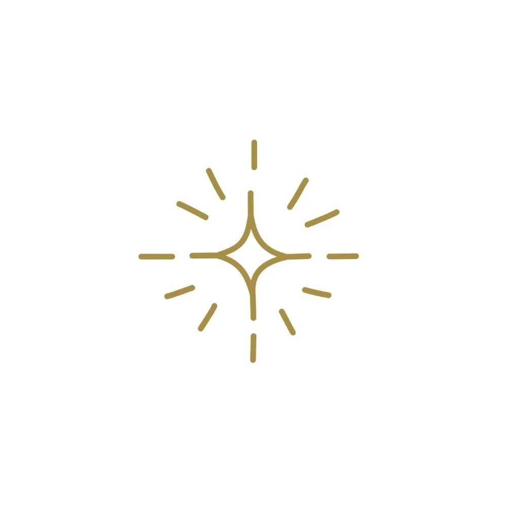 Minimalist gold starburst design on a white background.