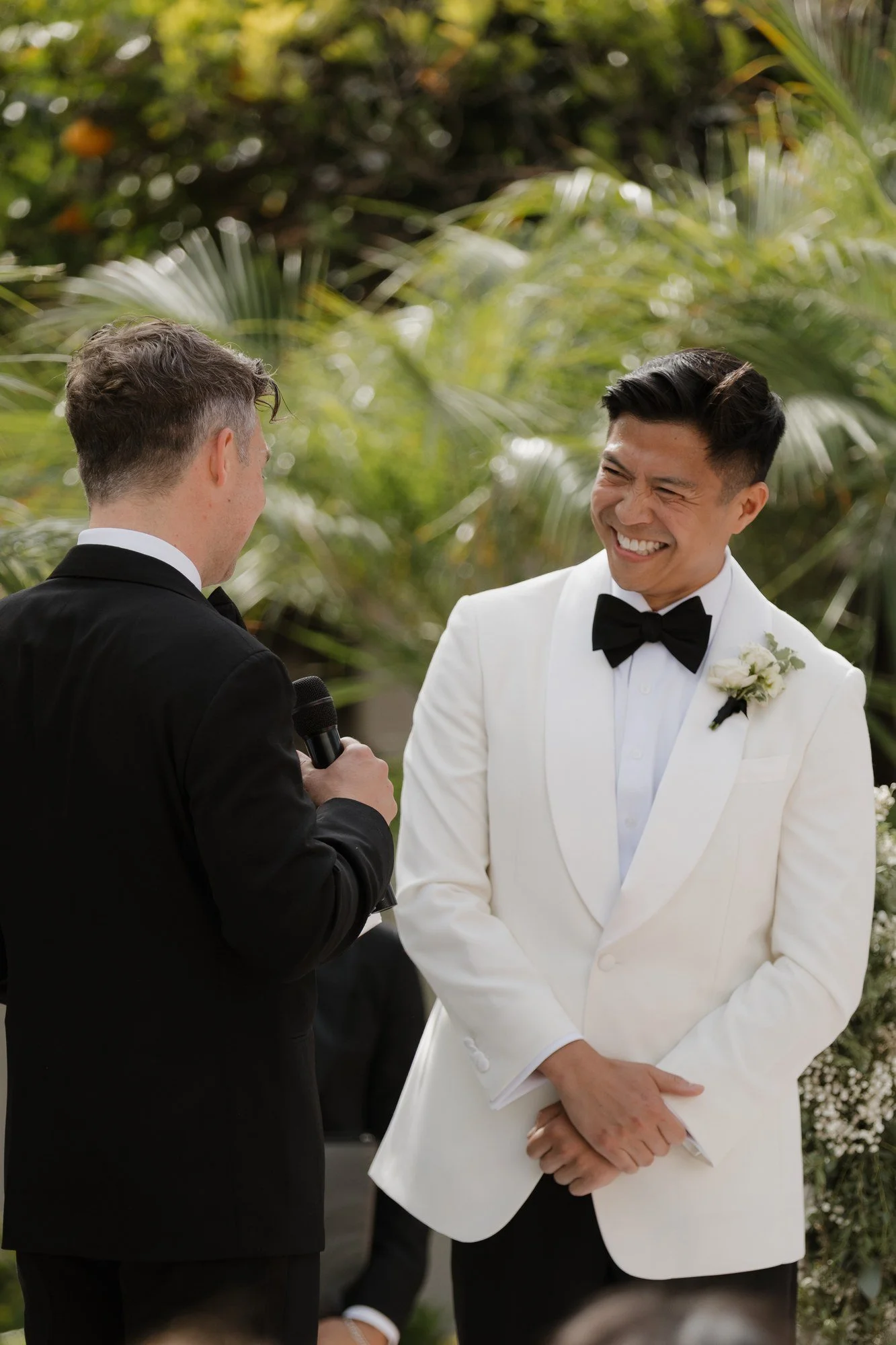 Ryan laughing during the vows at his Darlington House wedding ceremony