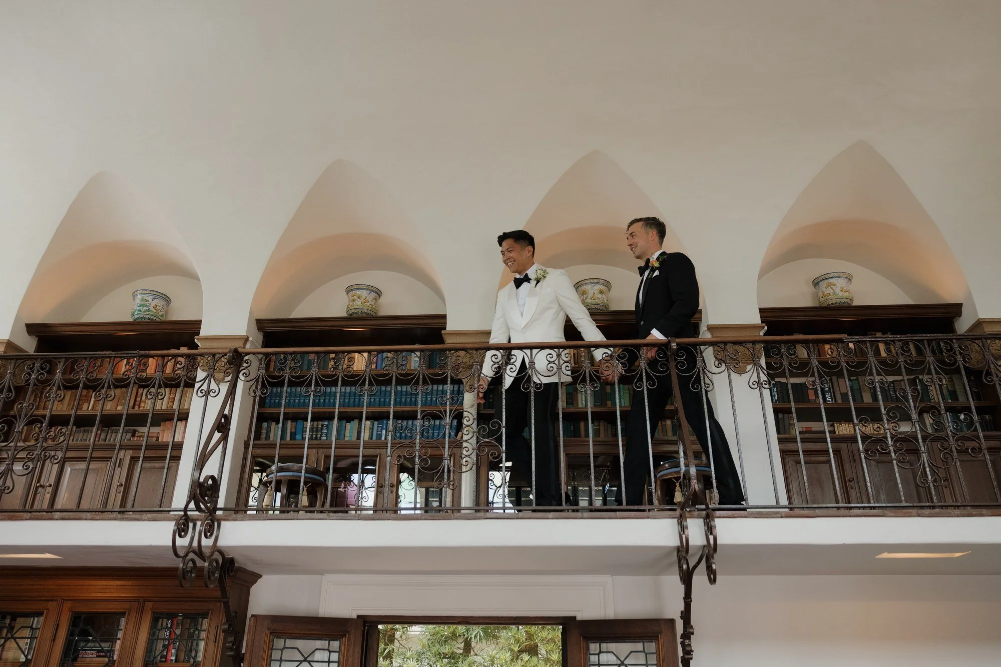 Ryan and Sean on the wrought-iron library balcony at Darlington House