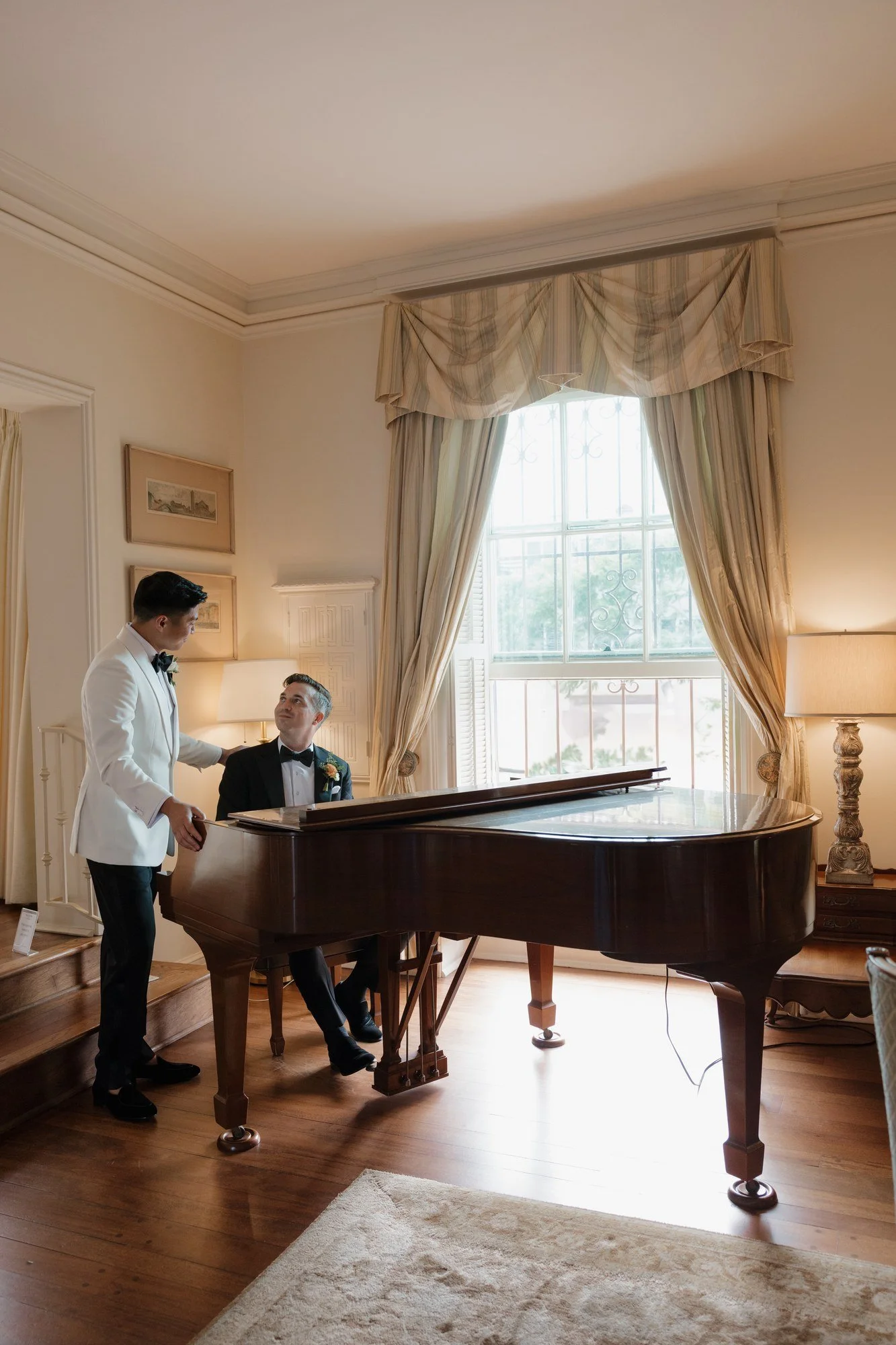 Ryan in the living room by the grand piano at Darlington House