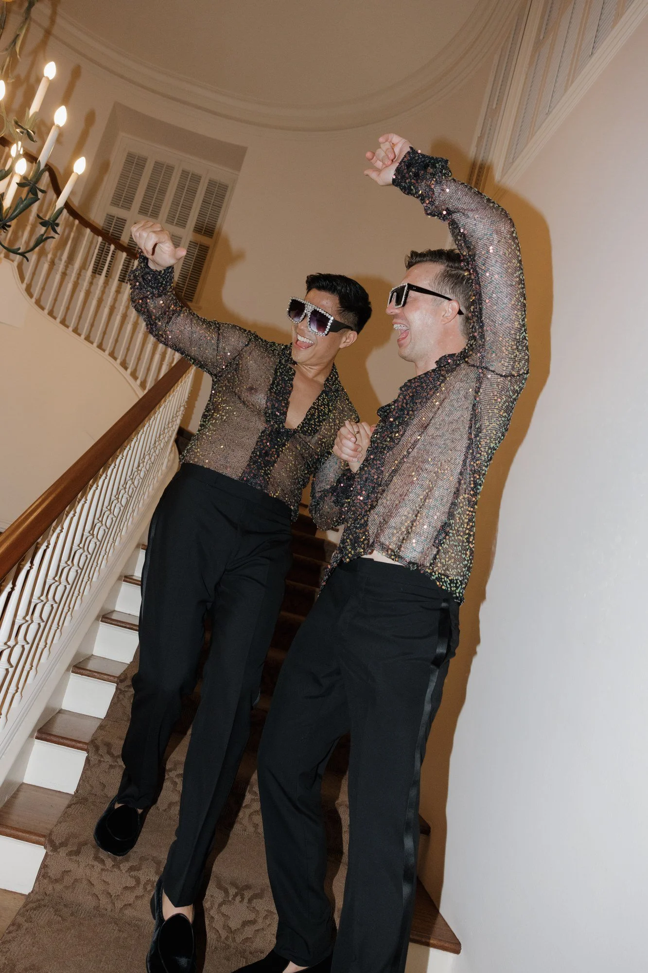 Ryan and Sean revealing their sparkly late-night outfits on the Darlington House staircase