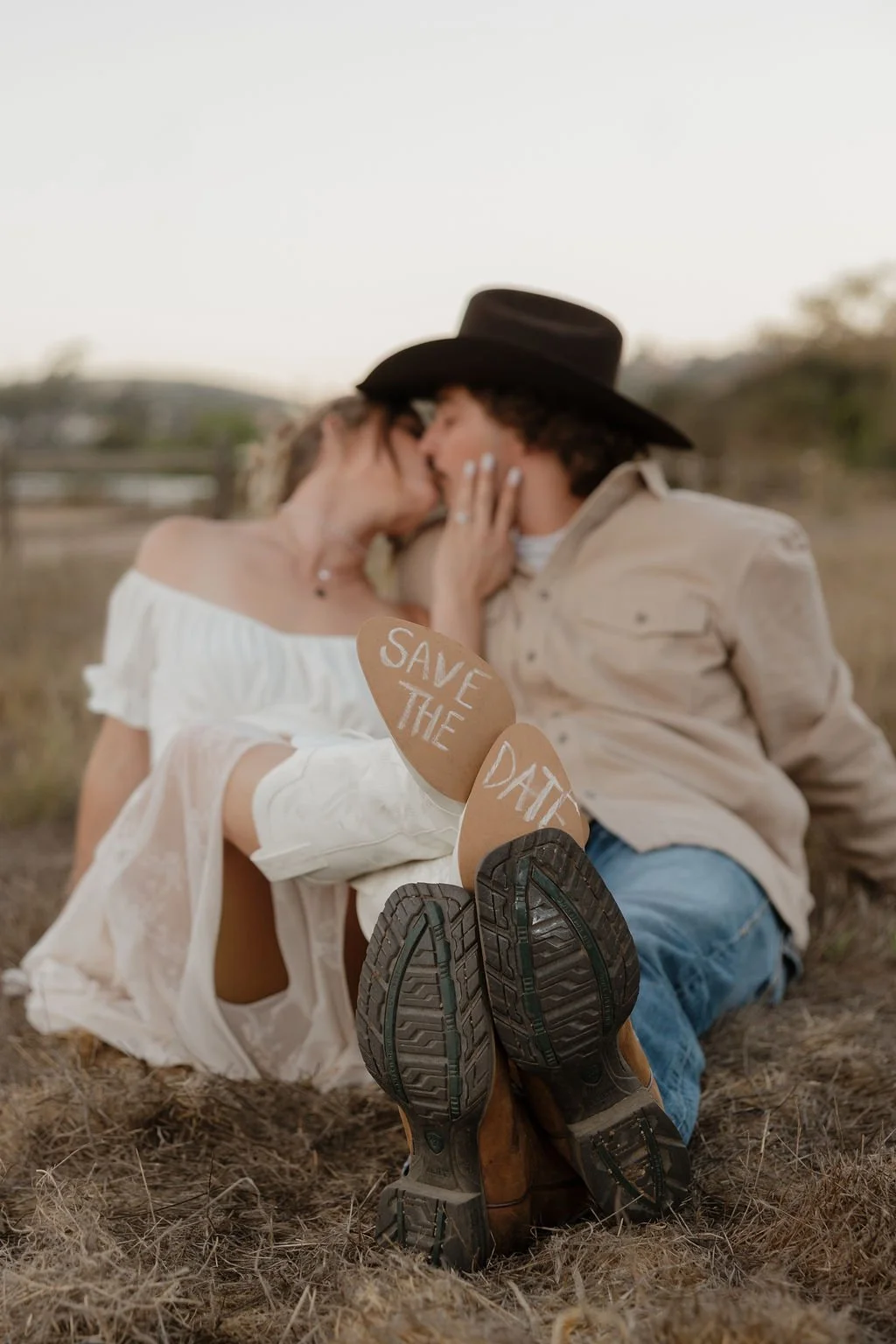 Intimate kiss in the dry grass at Los Penasquitos Canyon