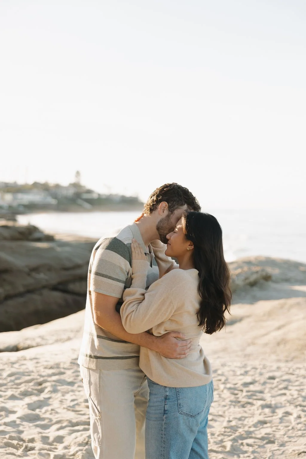 Close kiss on the sandstone rocks at Windansea Beach