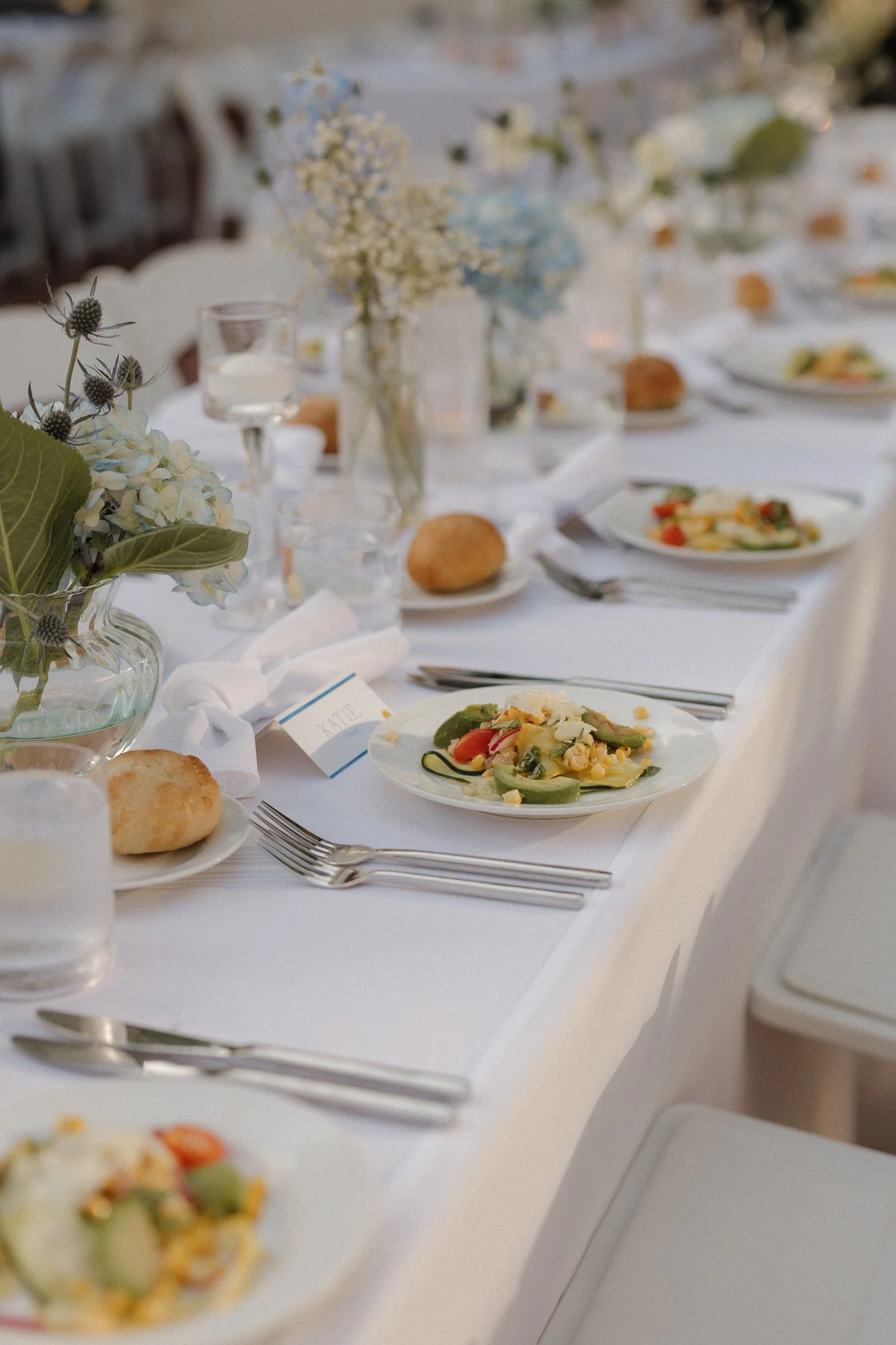 Plated first course on a long reception table at Darlington House
