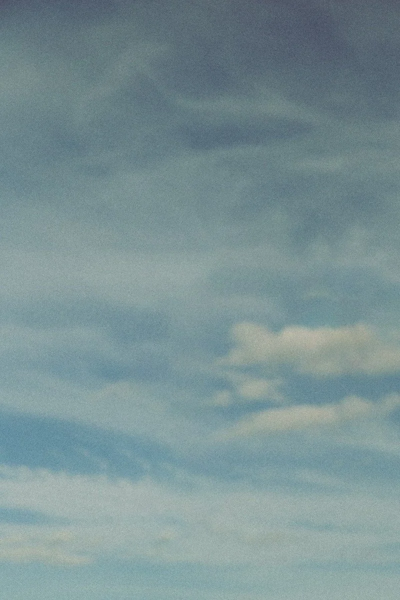 Clear sky with scattered clouds during daytime.