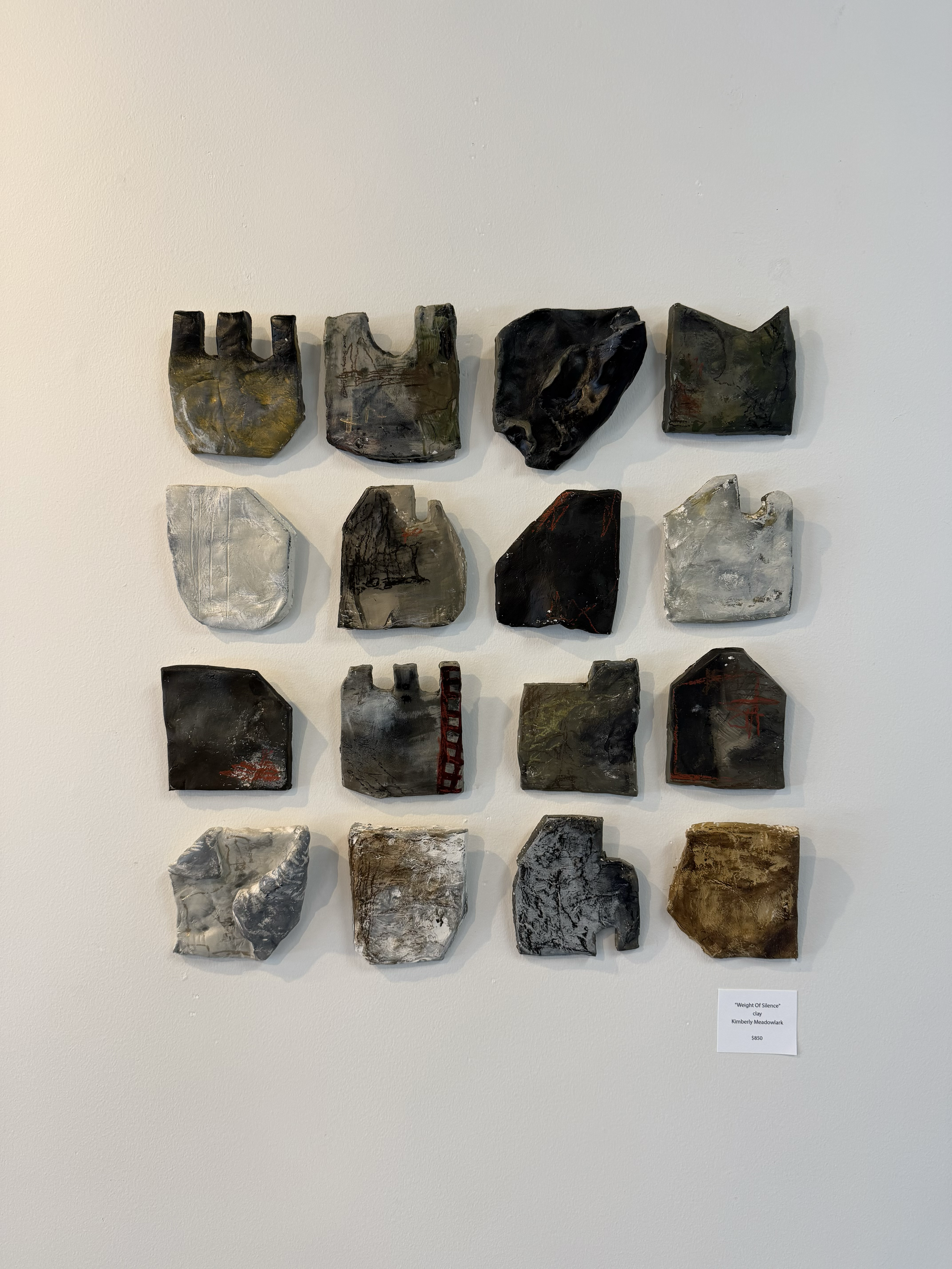 "WEIGHT OF SILENCE"   (clay sculpture)  $850
