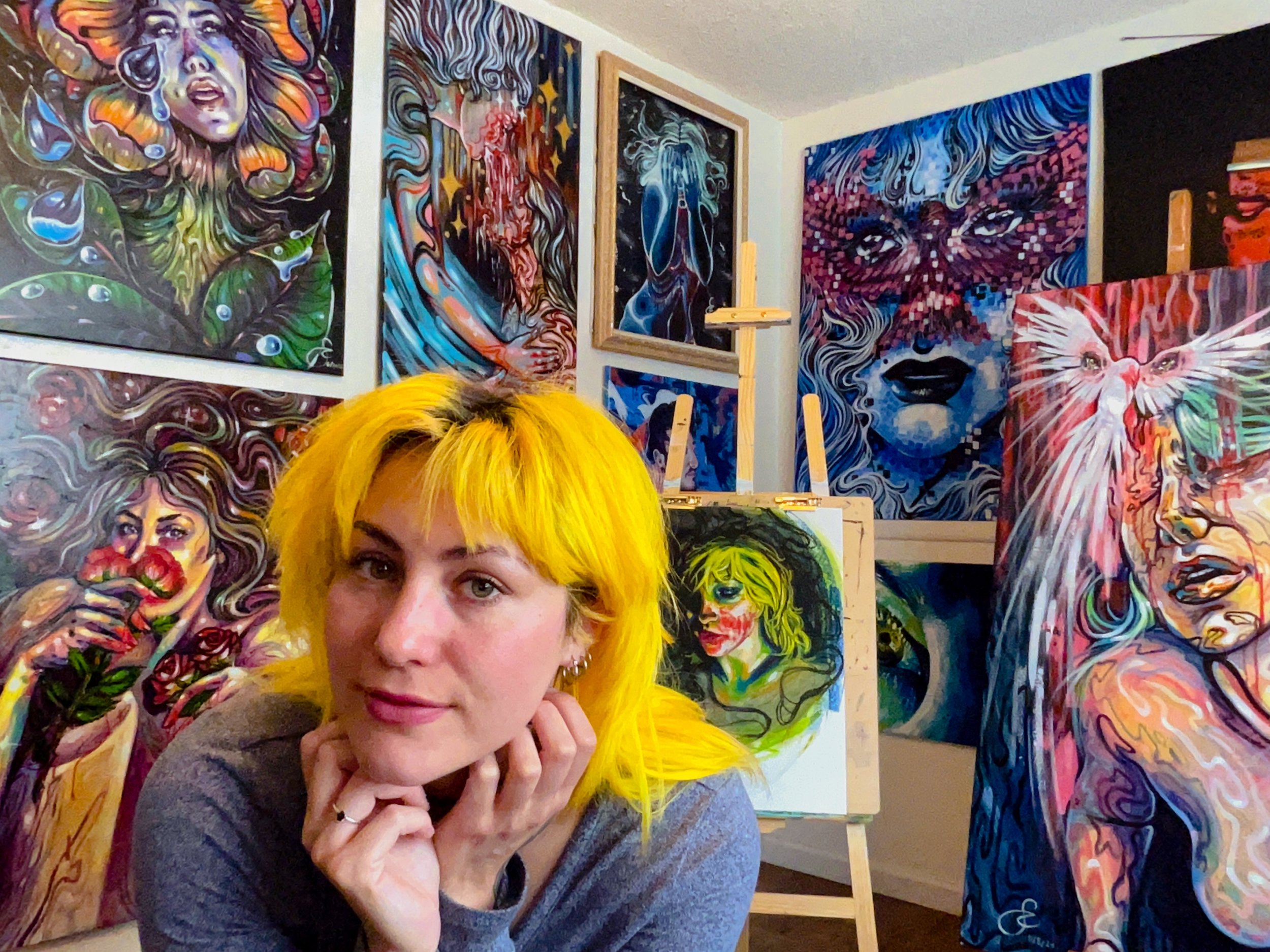 A snapshot of me in my very full studio.