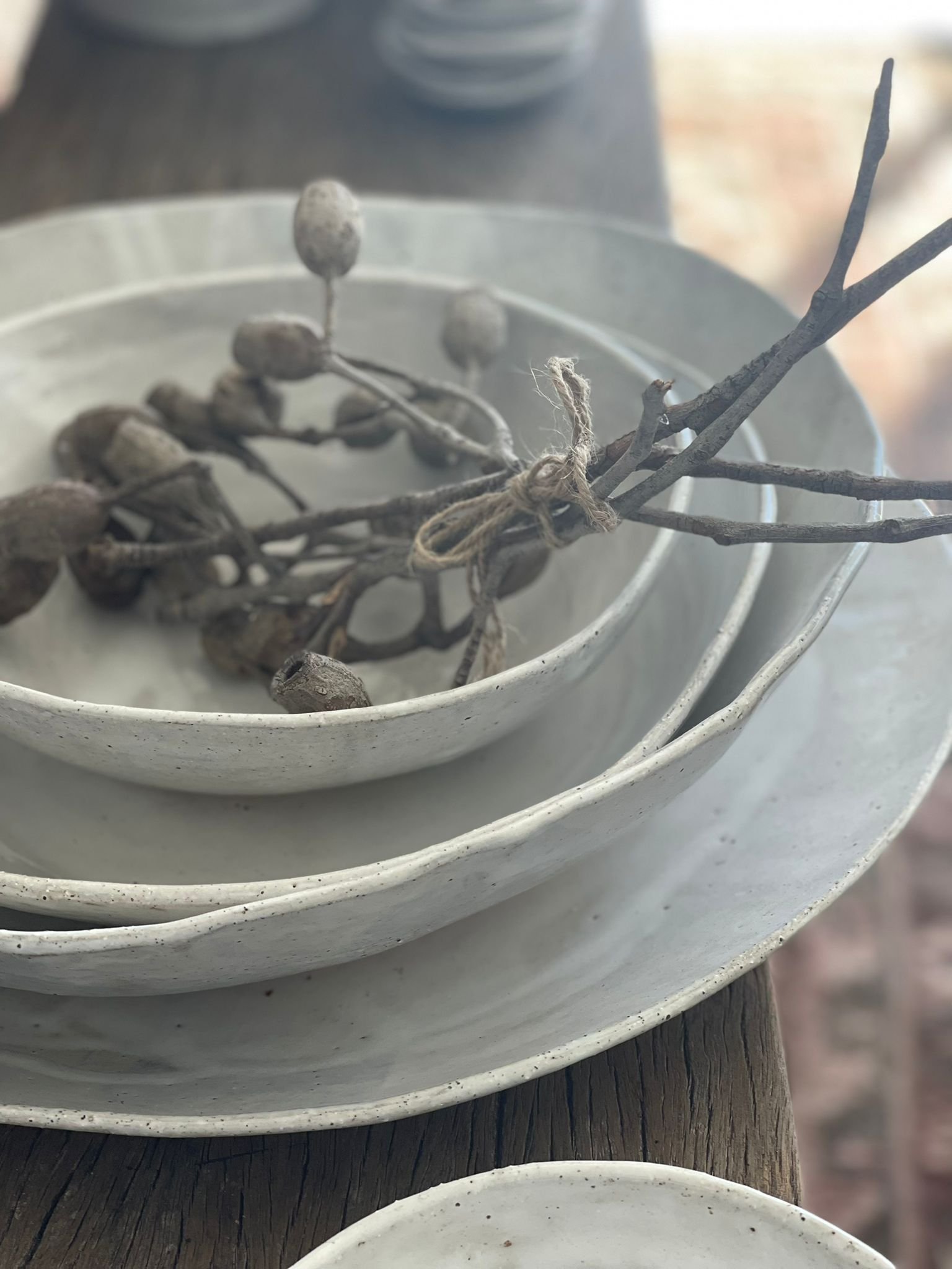 A handcrafted French White XL Platter (38cm) by Melissa Lellouche, featuring a glossy white ceramic finish, perfect for serving mains, cheeses, or desserts with elegance.