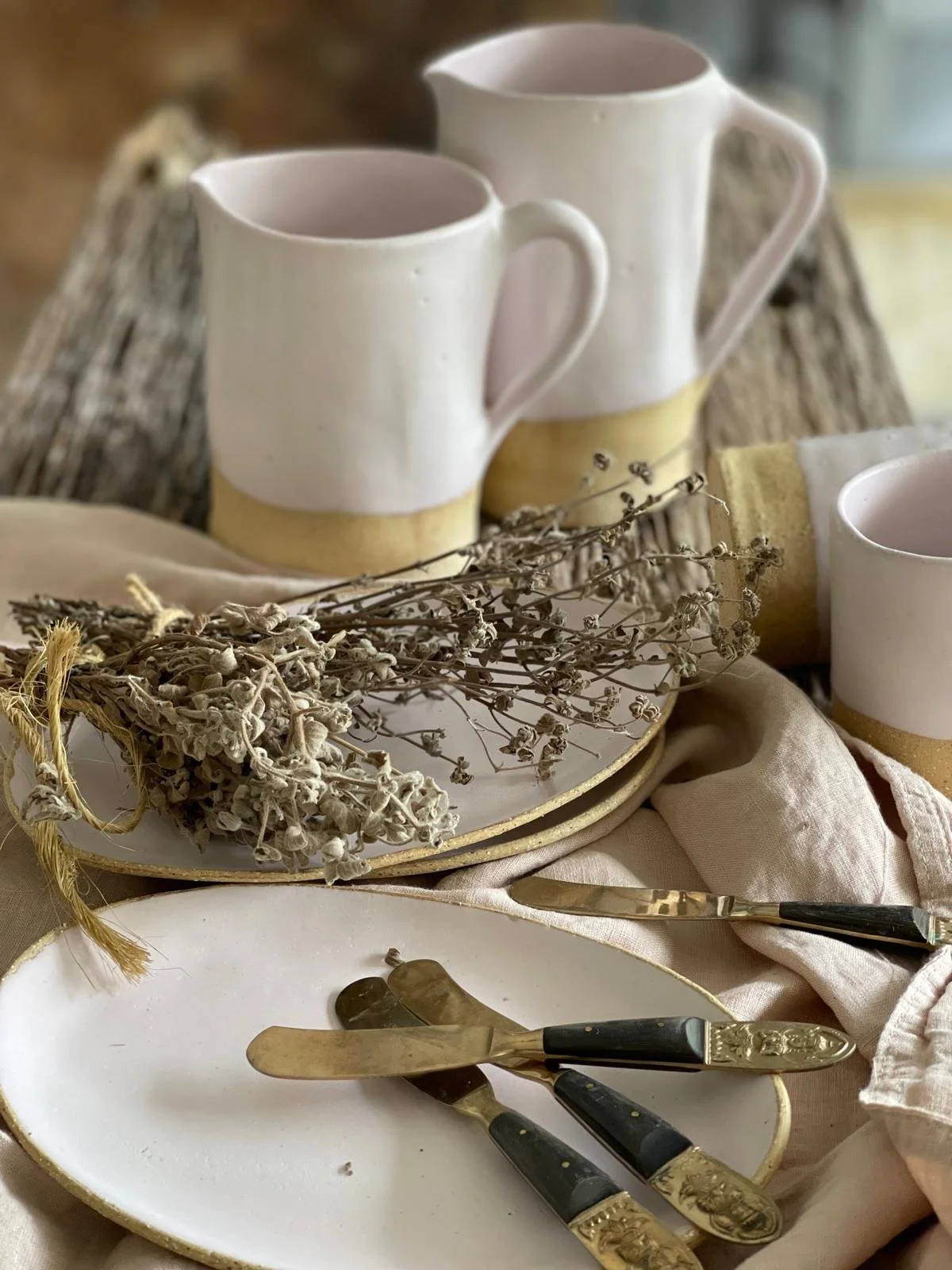 Blush Oval Side Plate – 22cm handmade ceramic plate by Melissa Lellouche featuring a matte blush glaze and raw edge. Part of the Blush Collection.