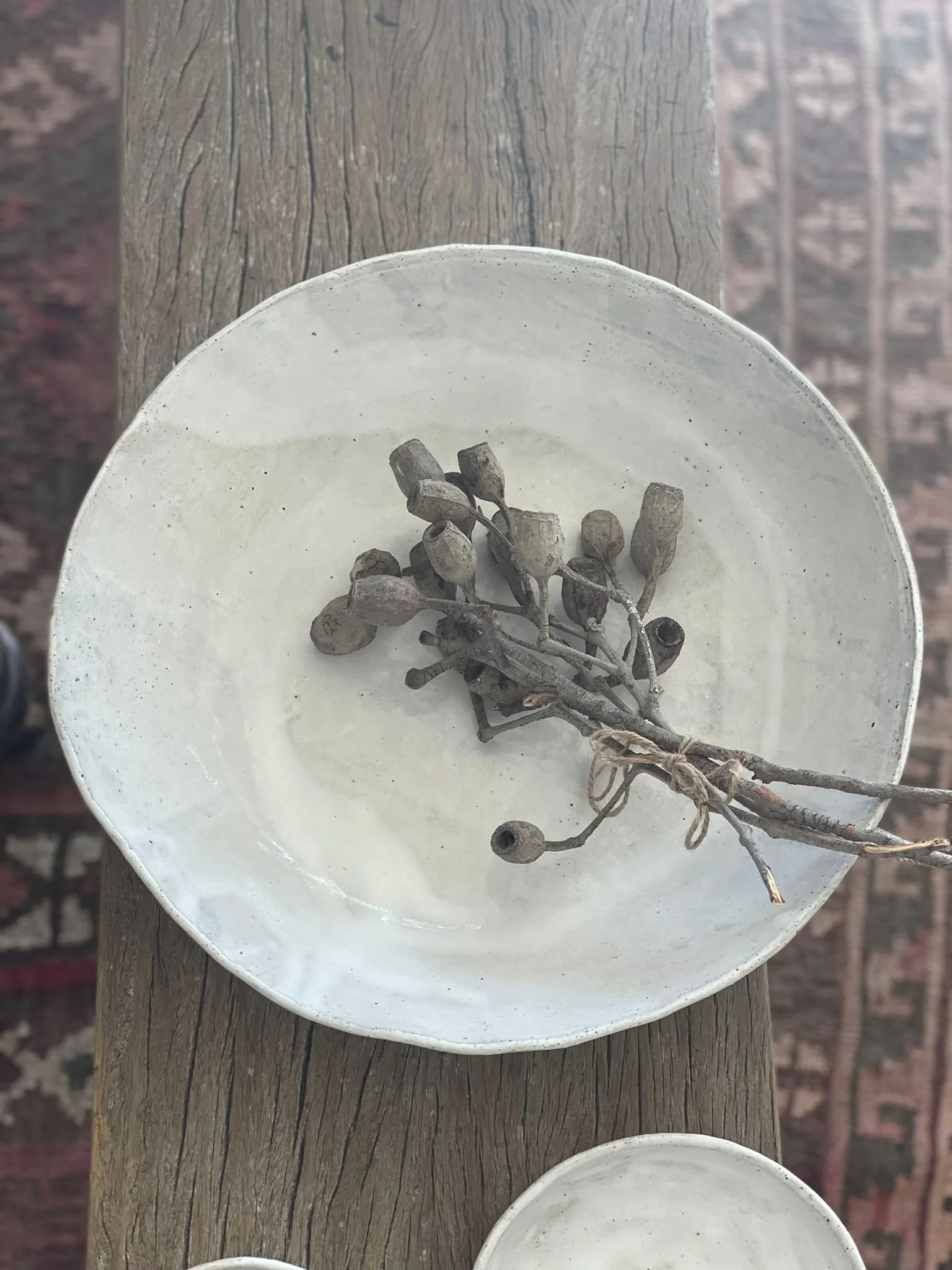 A handcrafted French White Large Serving Bowl (35cm) by Melissa Lellouche, featuring a glossy white ceramic finish, ideal for serving salads, pasta, or shared dishes with elegance.