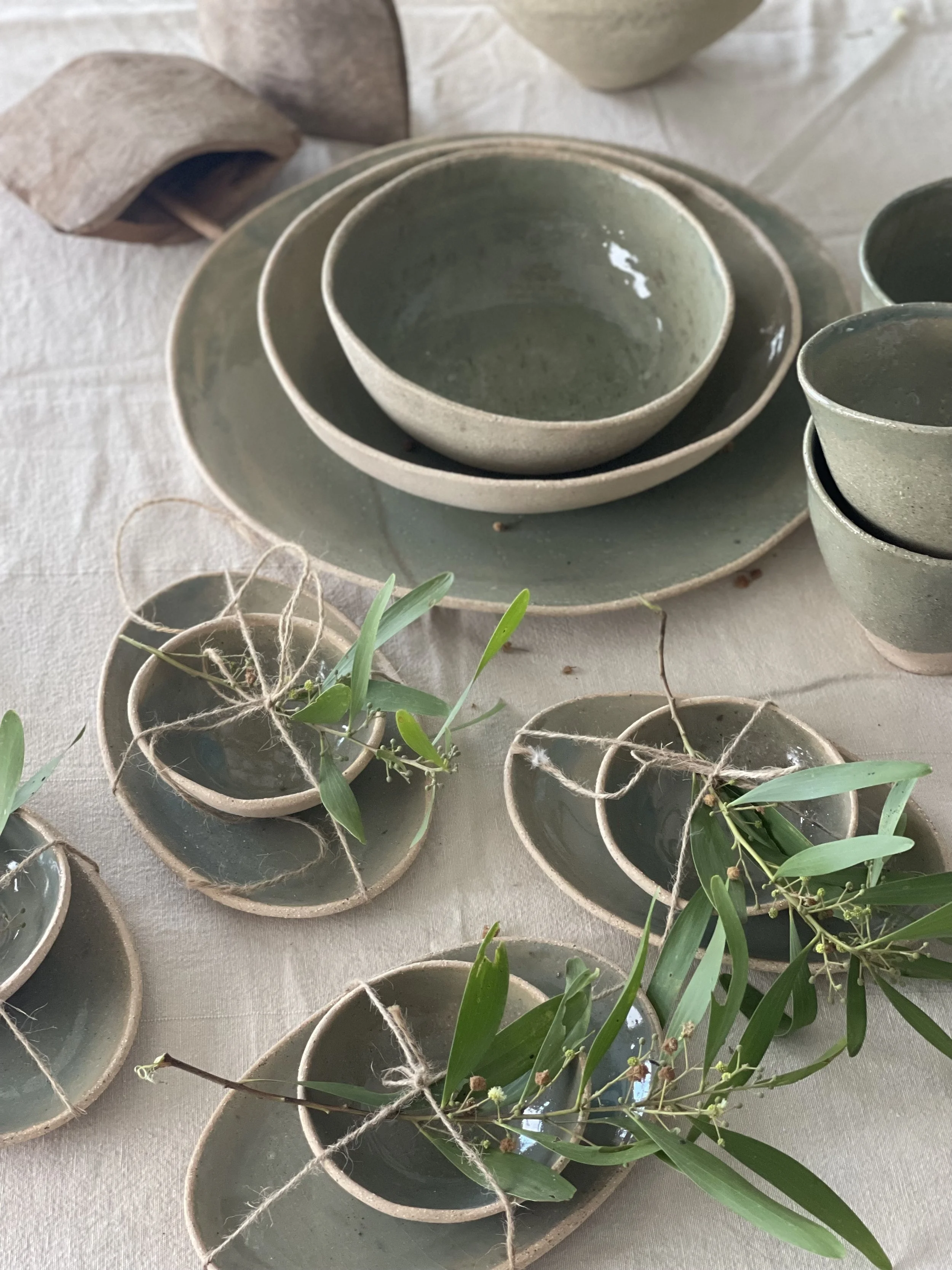 Handmade 23cm Olive Green Curry Bowl by Melissa Lellouche with gloss glaze and natural finish.