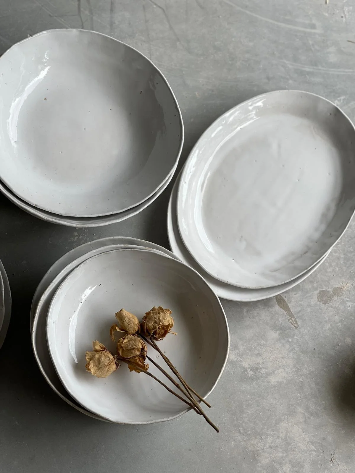 French White Oval Plate – 34cm handmade ceramic serving plate by Melissa Lellouche with glossy French White glaze. Part of the French White Collection.