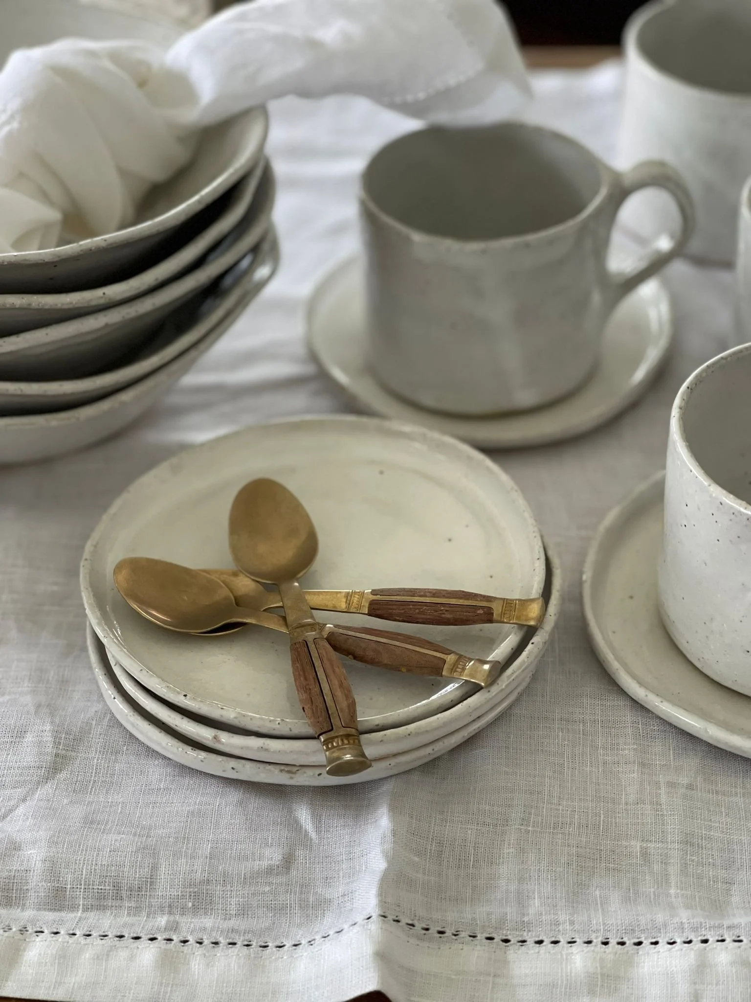 A handcrafted French White Cookie Plate (14cm) by Melissa Lellouche, featuring a glossy white ceramic finish, ideal for serving cookies, pastries, or small treats.
