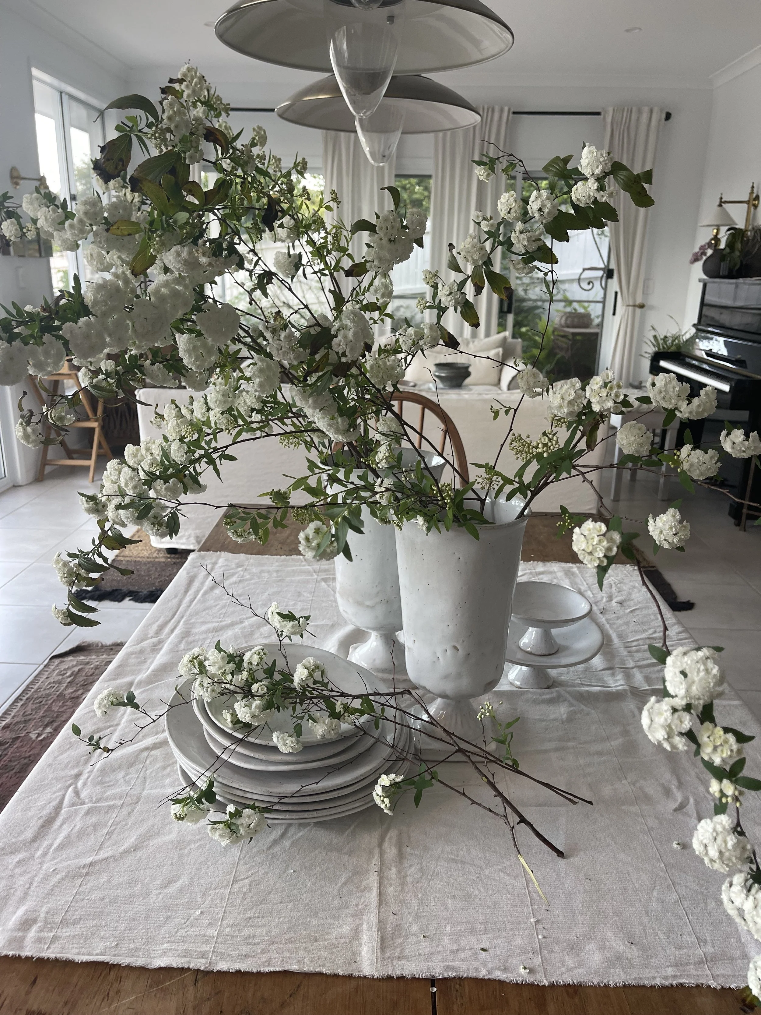 A handcrafted French White medium Classic Stand Vase, 32cm high with a glossy ceramic finish, featuring an elegant tapered design for floral arrangements or standalone decor. (Copy)