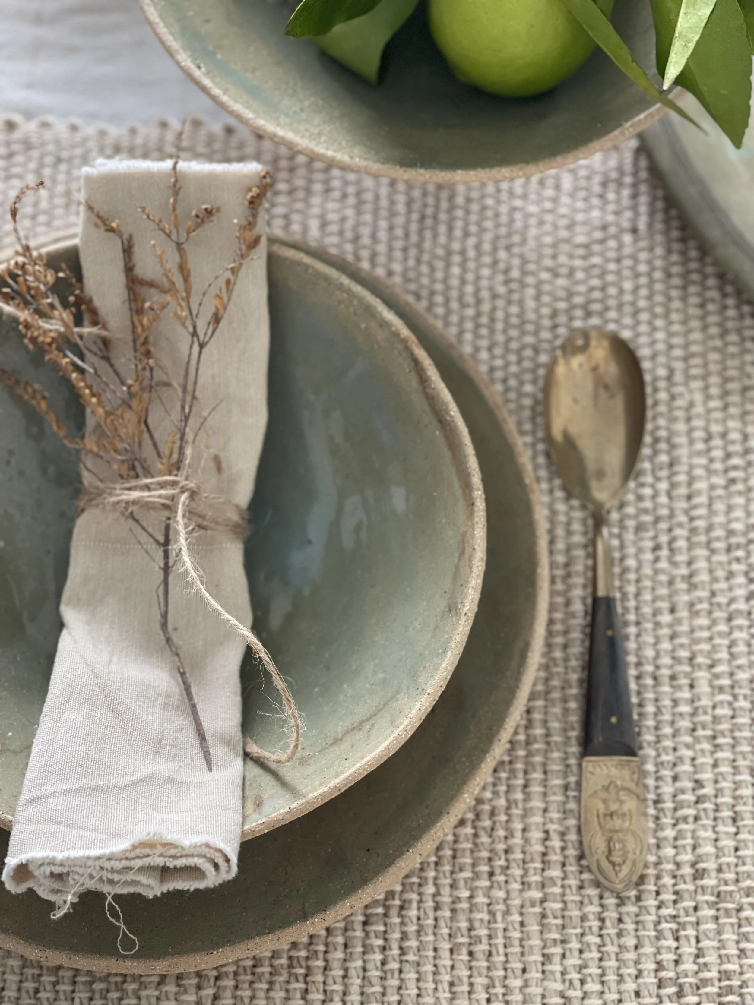 Handmade 23cm Olive Green Curry Bowl by Melissa Lellouche with gloss glaze and natural finish.