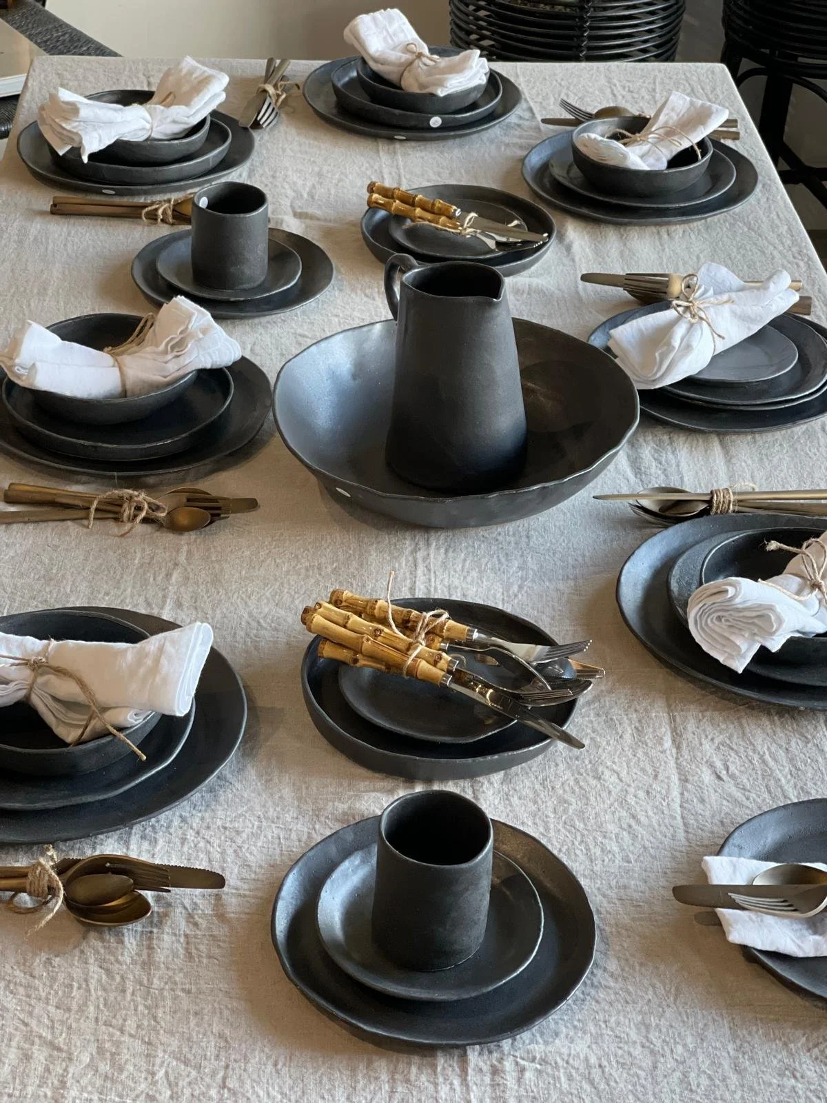 Charcoal Dinner Plate – 27cm handmade ceramic plate by Melissa Lellouche with a satin matte charcoal glaze and raw edge. Part of the Charcoal Collection.