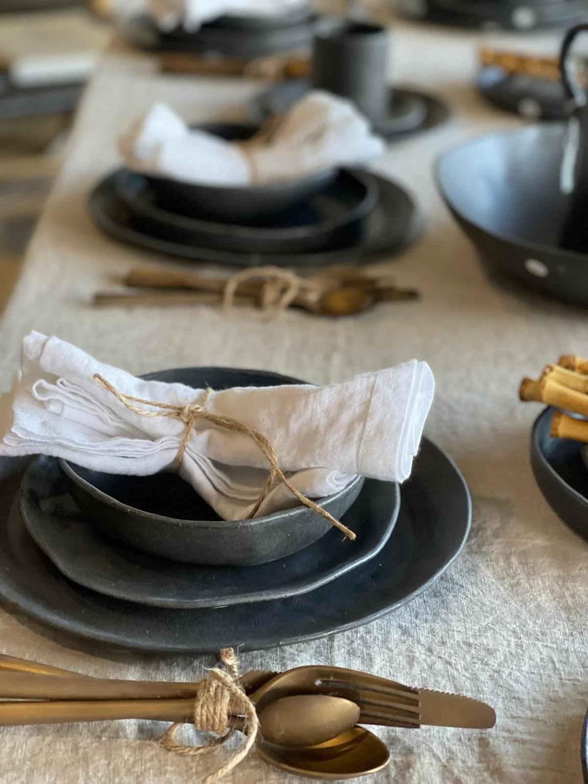 Charcoal Dinner Plate – 27cm handmade ceramic plate by Melissa Lellouche with a satin matte charcoal glaze and raw edge. Part of the Charcoal Collection.