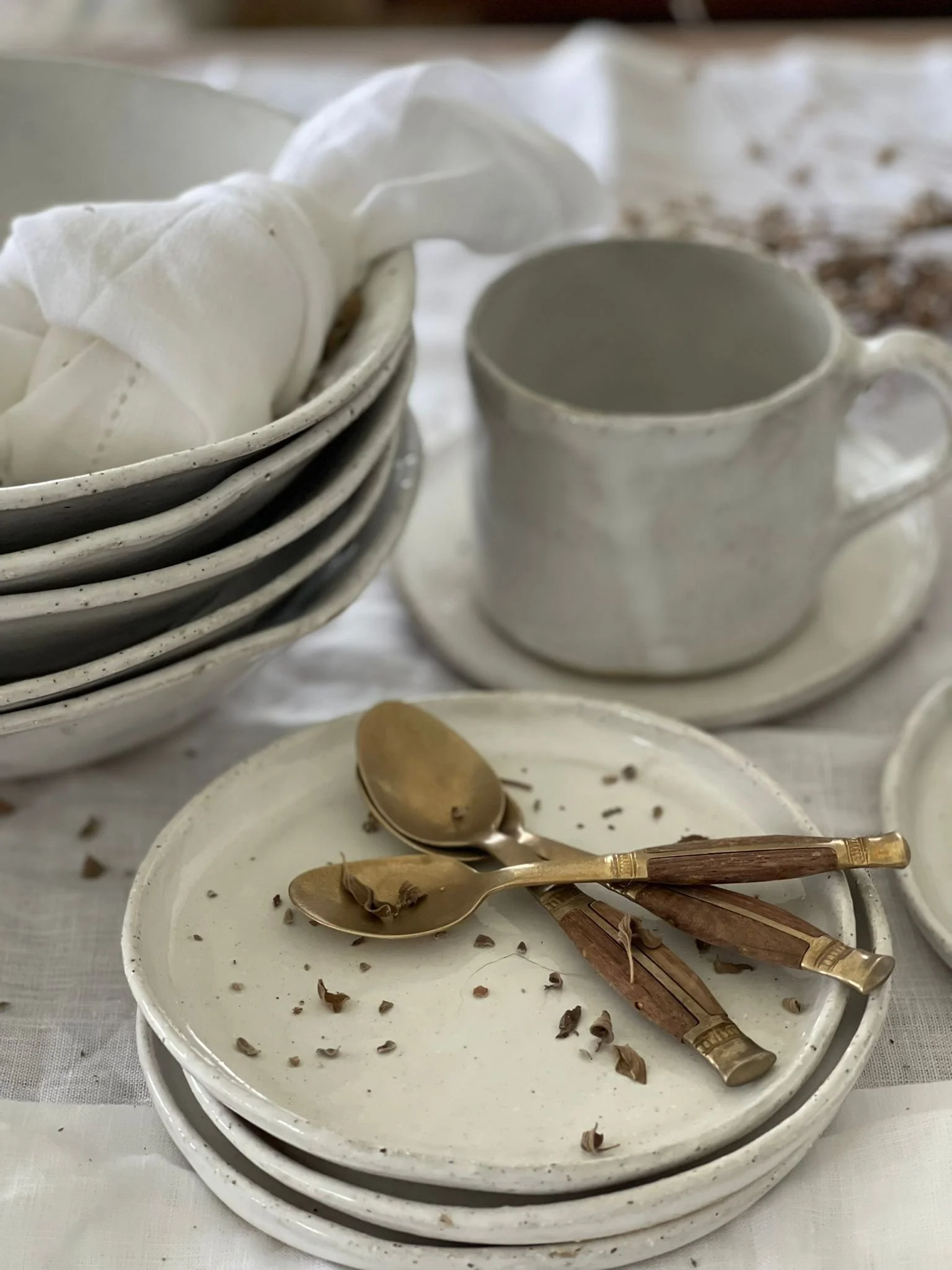 A handcrafted French White Classic Mug (250ml) by Melissa Lellouche, featuring a glossy white ceramic finish with a wide, comfortable shape, perfect for coffee or tea.