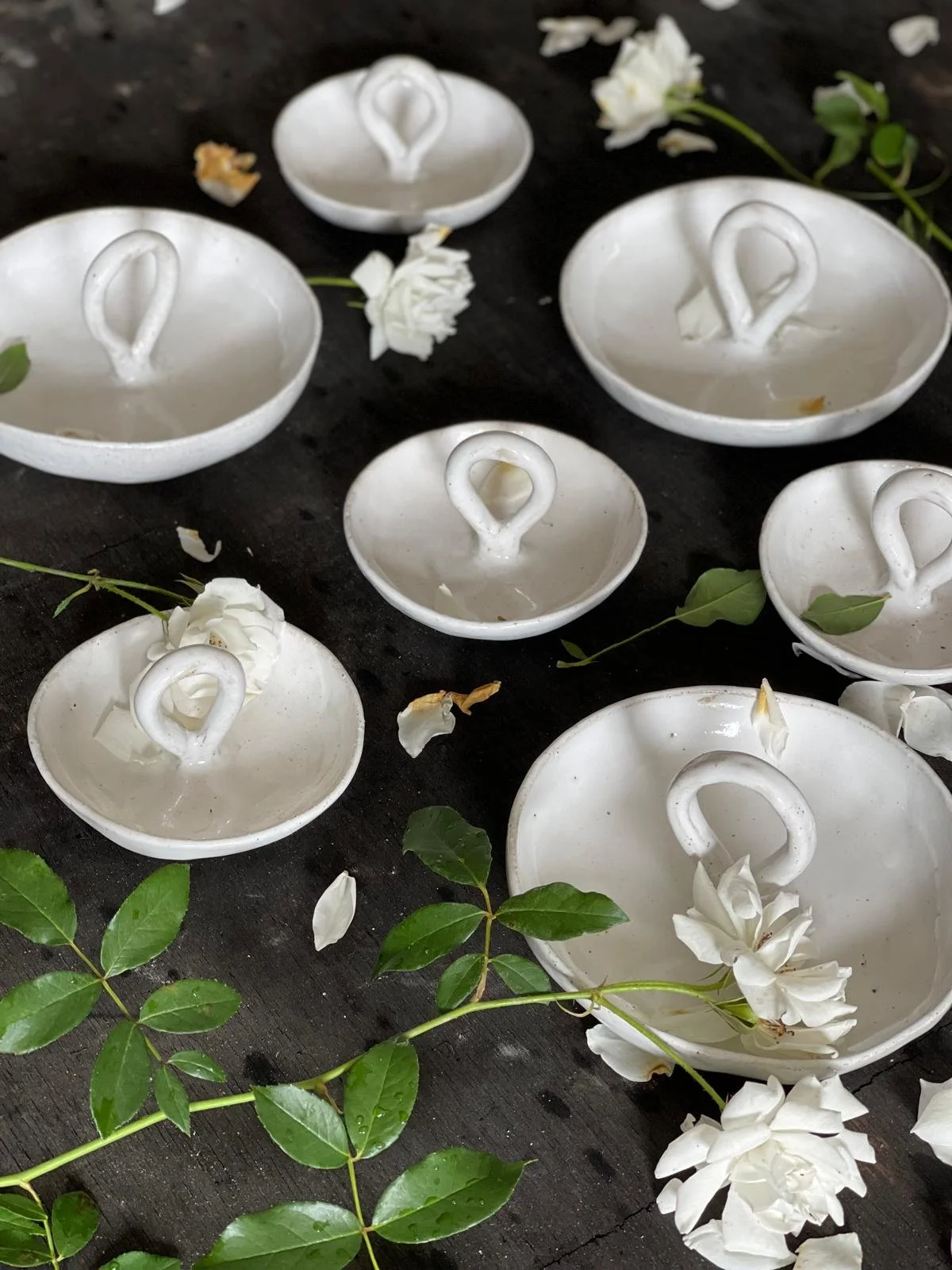 A handcrafted French White Carry Bowl by Melissa Lellouche, featuring a glossy white ceramic finish and minimalist design, perfect for serving or as a décor accent.