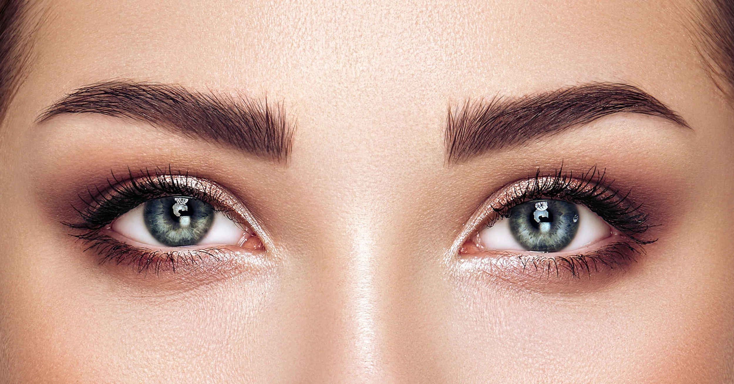 Close-up of natural-looking permanent makeup eyebrows with balanced shape and symmetry at Salvation Beauty Ink