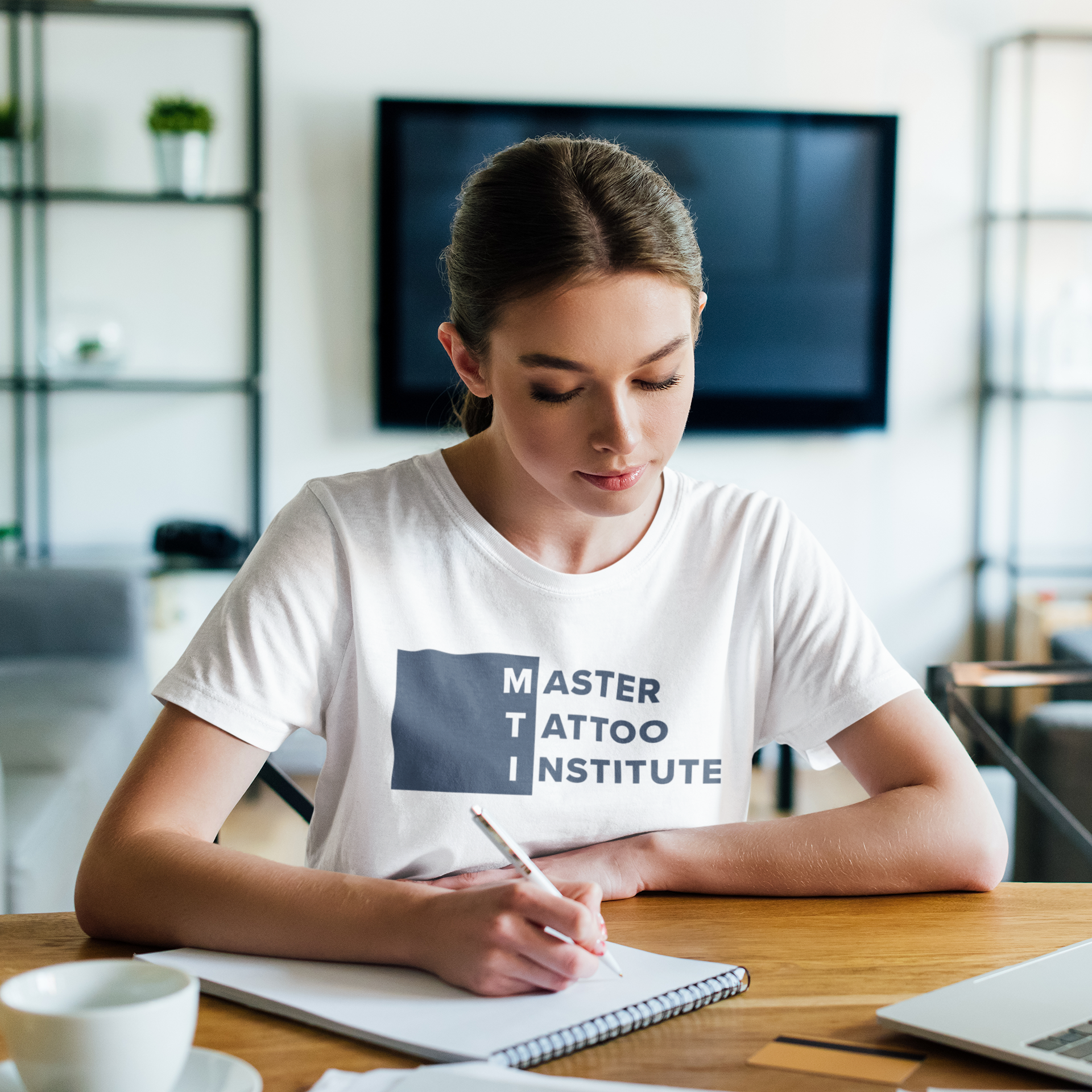 Student enrolled at Master Tattoo Institute learning professional tattoo education