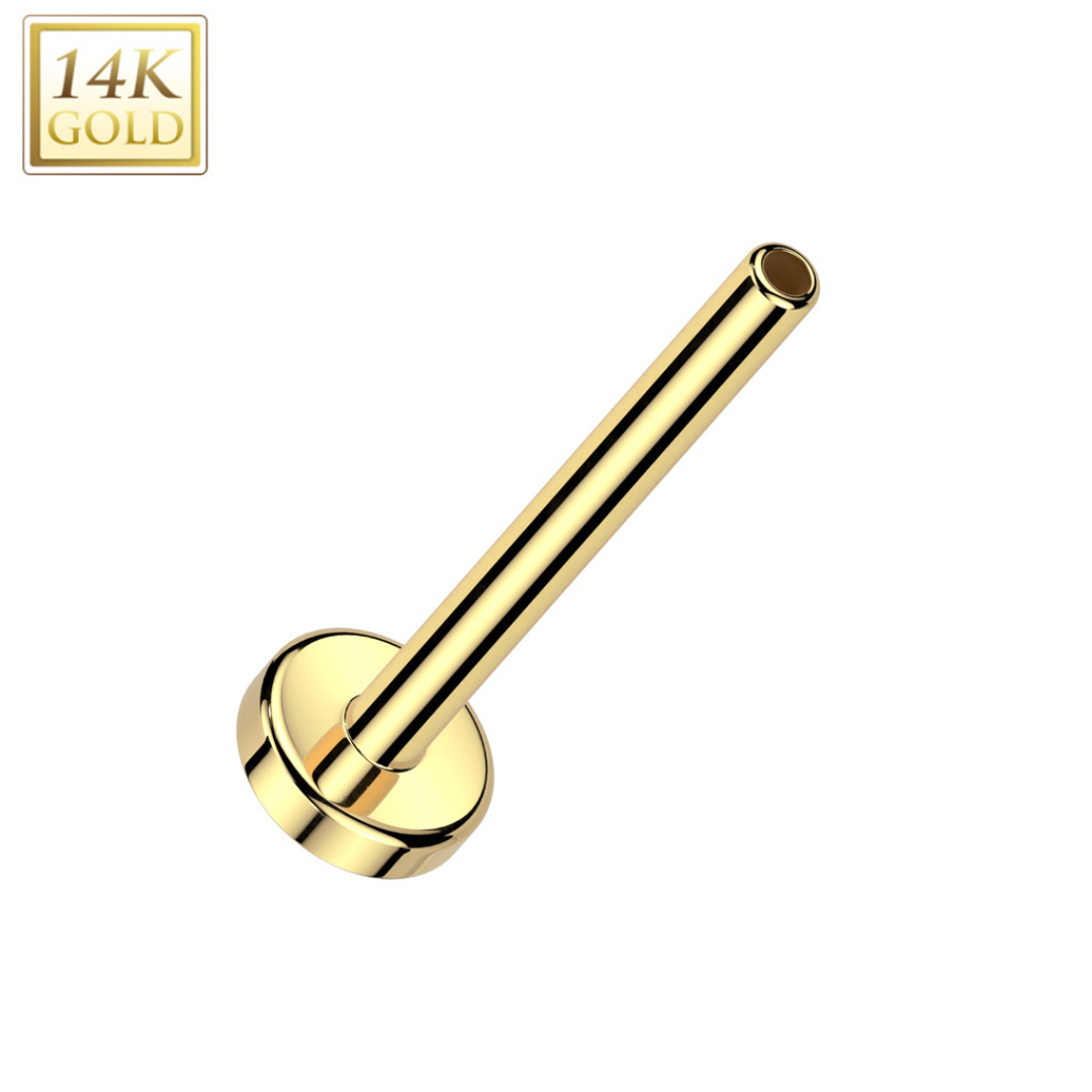 A 14k Gold flat back jewelry stud.