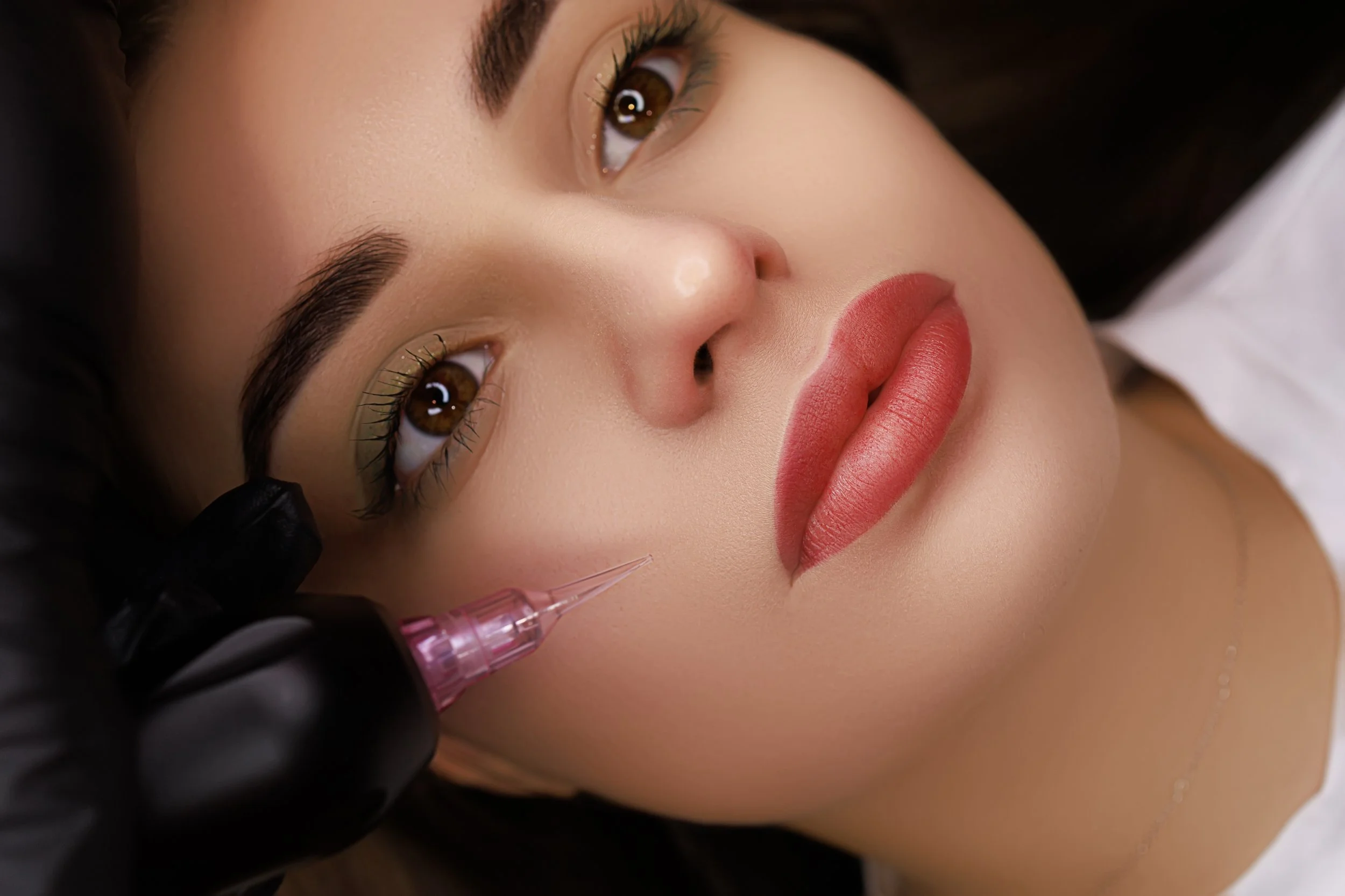 Lip blush permanent makeup procedure enhancing natural lip color and shape at Salvation Beauty Ink