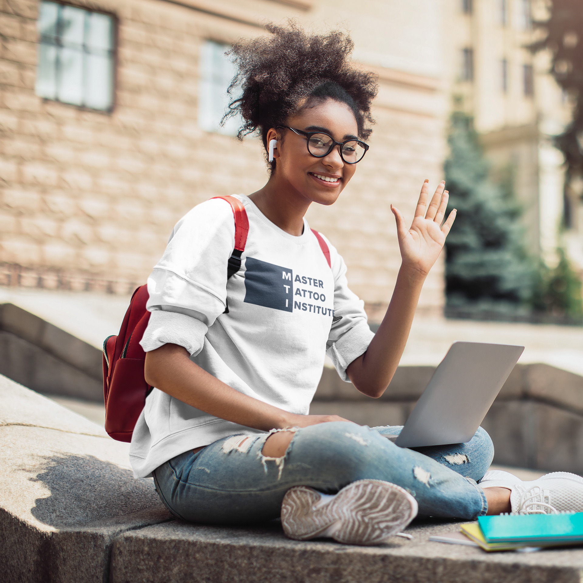 Online tattoo school student attending virtual training through Master Tattoo Institute