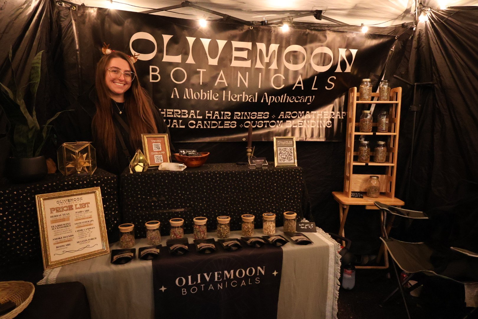 OliveMoon Booth - 4 (holiday pic me with booth).jpeg