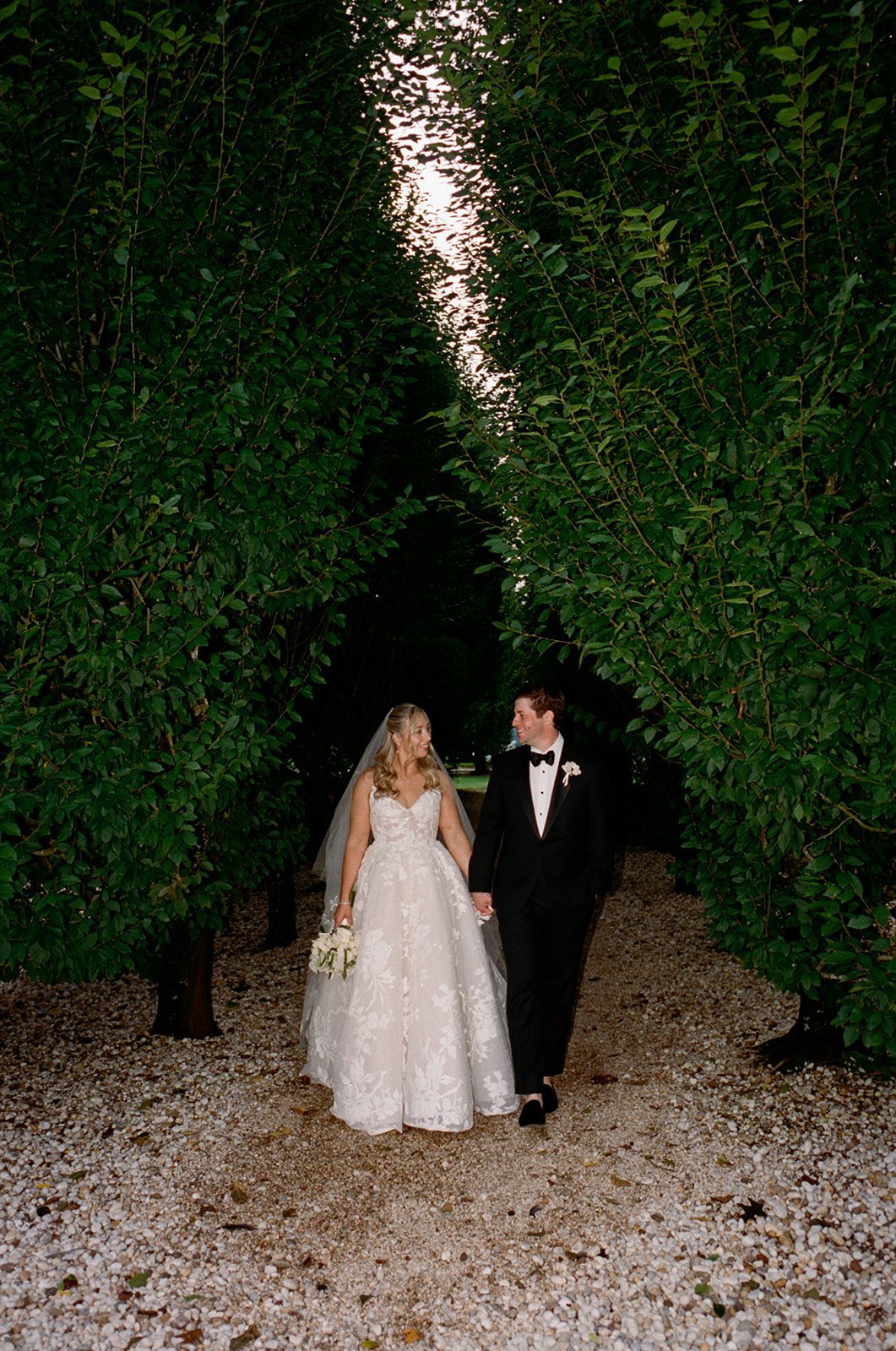 longhouse-reserve-wedding-couple-hedge-corridor-34.jpg