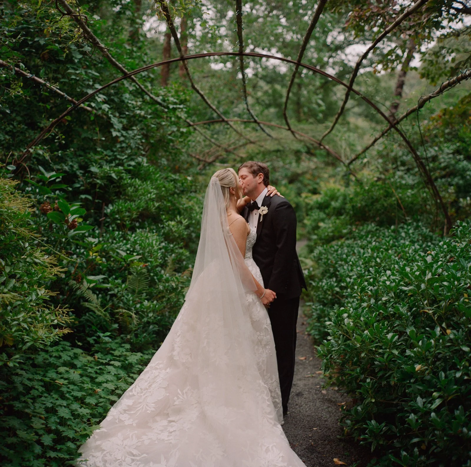 longhouse-reserve-wedding-kiss-woodland-path-38.jpg