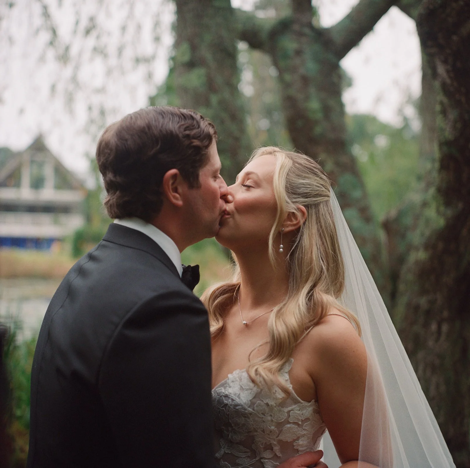 longhouse-reserve-wedding-close-kiss-pond-36.jpg