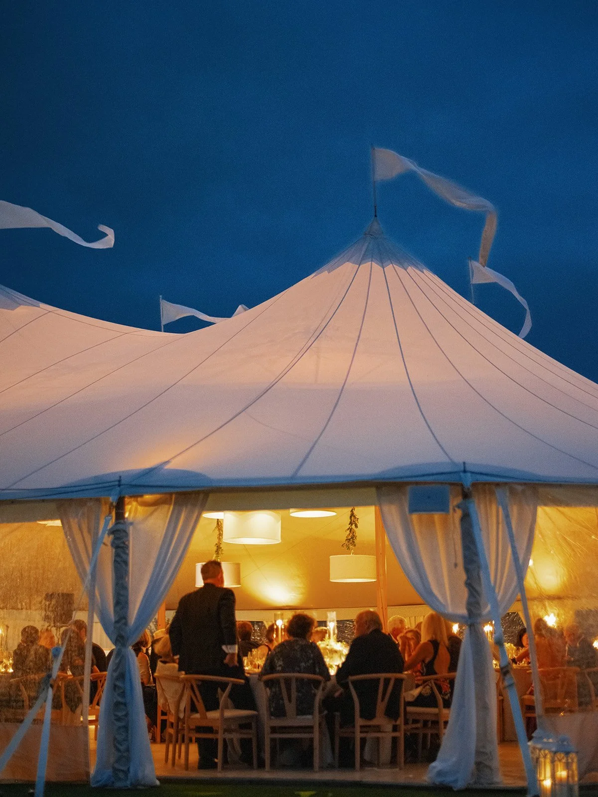 maidstone-club-wedding-venue-tent-glowing-at-dusk-17.jpg