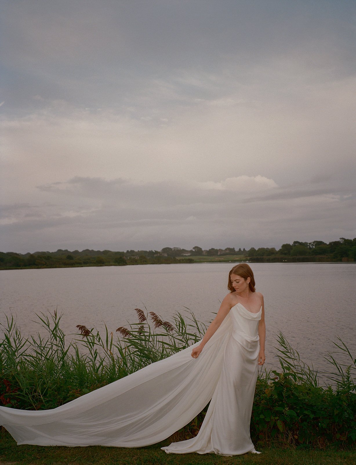maidstone-club-wedding-venue-bride-train-hook-pond-13.jpg