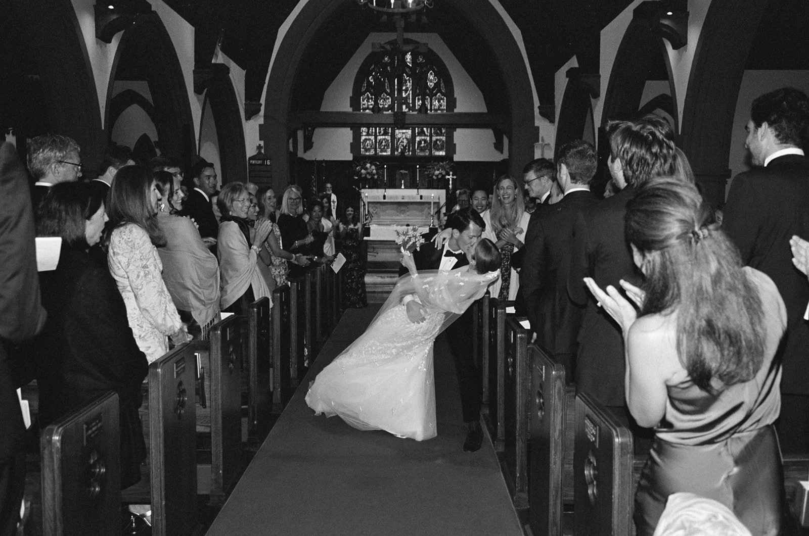 st-lukes-east-hampton-wedding-final-dip-in-aisle-bw-22.jpg